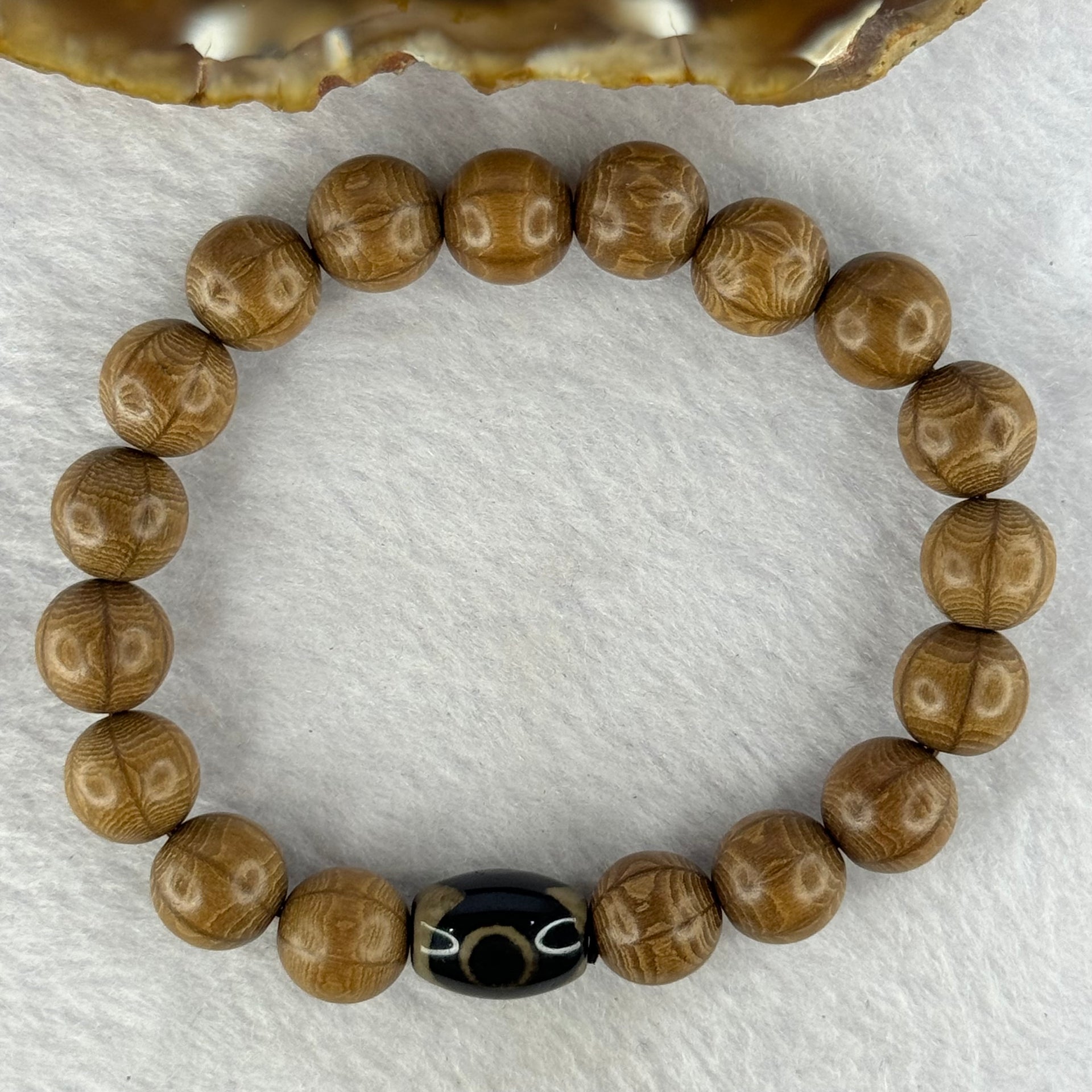 Natural Six Way Wooden Bead With 3 Eyes Dzi Bead Tian Zhu Beads Bracelets 天然六道木带三眼天珠手链 11.37g 16.5cm 10.4mm 18 Beads/ 13.5 by 10.1mm 1 Bead - Huangs Jadeite and Jewelry Pte Ltd