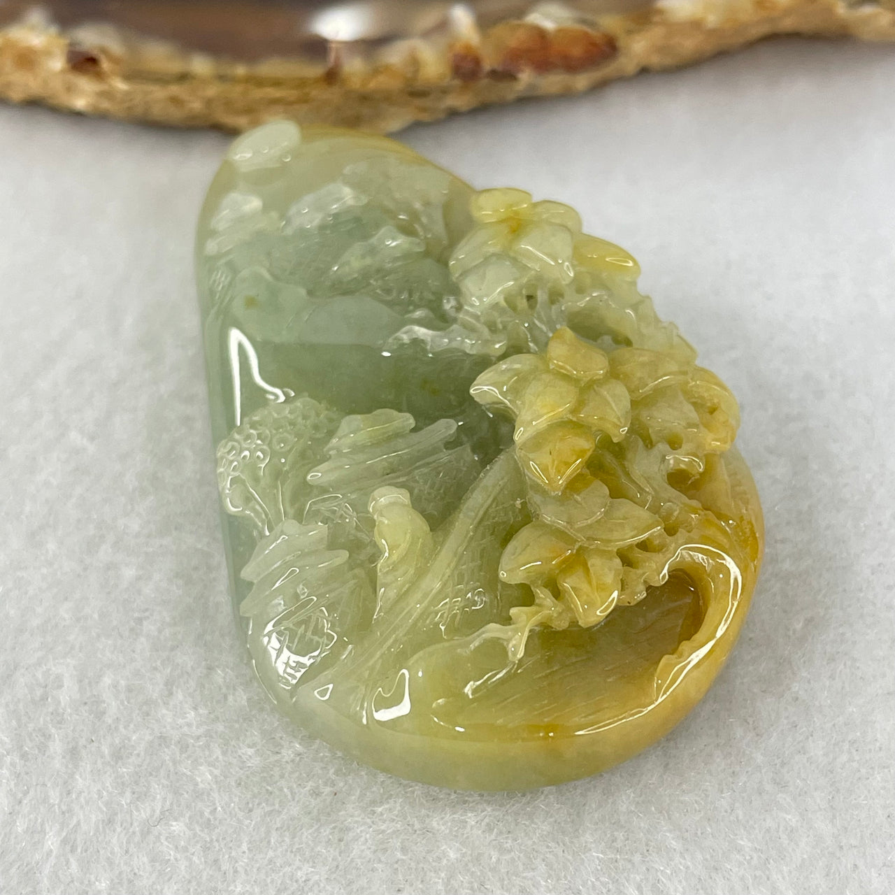 Type A Blueish Green with Yellow Brown Patches Jadeite Shan Shui with Gui Ren Benefactor Pendant 41.42g 56.0 by 34.0 by 13.8mm