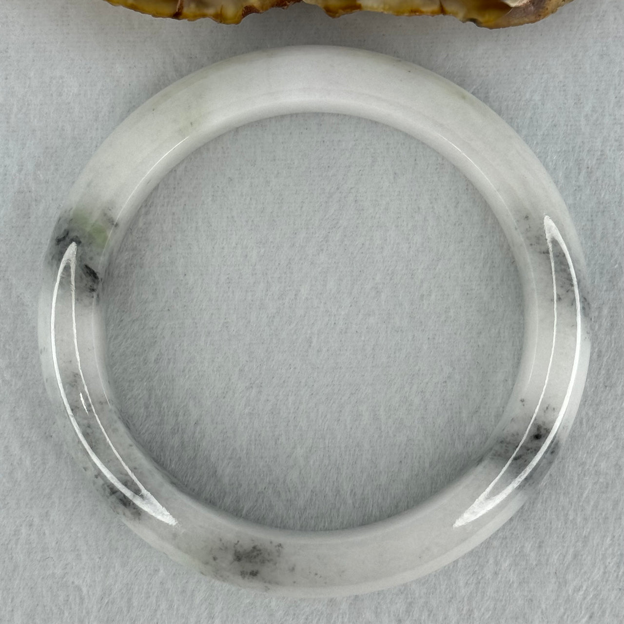 Type A Faint Lavender Green to White with Grey Wuji Patches Jadeite Bangle Internal Diameter 58.2mm 70.55g 14.0 by 9.3mm (Very Slight Internal Lines)