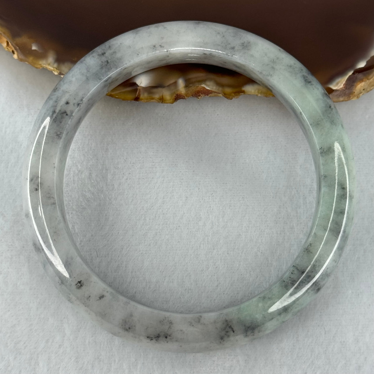 Type A Faint Green and Black Piao Hua Jadeite Bangle Internal Diameter 57.2mm 65.08g 13.4 by 8.7mm (Very Slight Internal Lines)