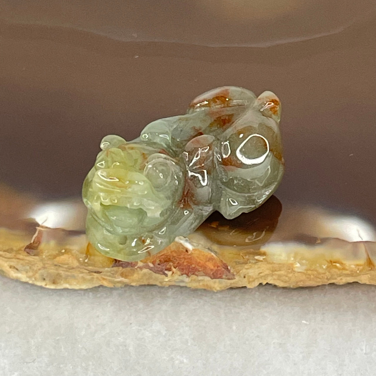 Type A Brownish Green Jadeite Pixiu Charm 6.56g 24.8 by 12.5 by 11.1mm