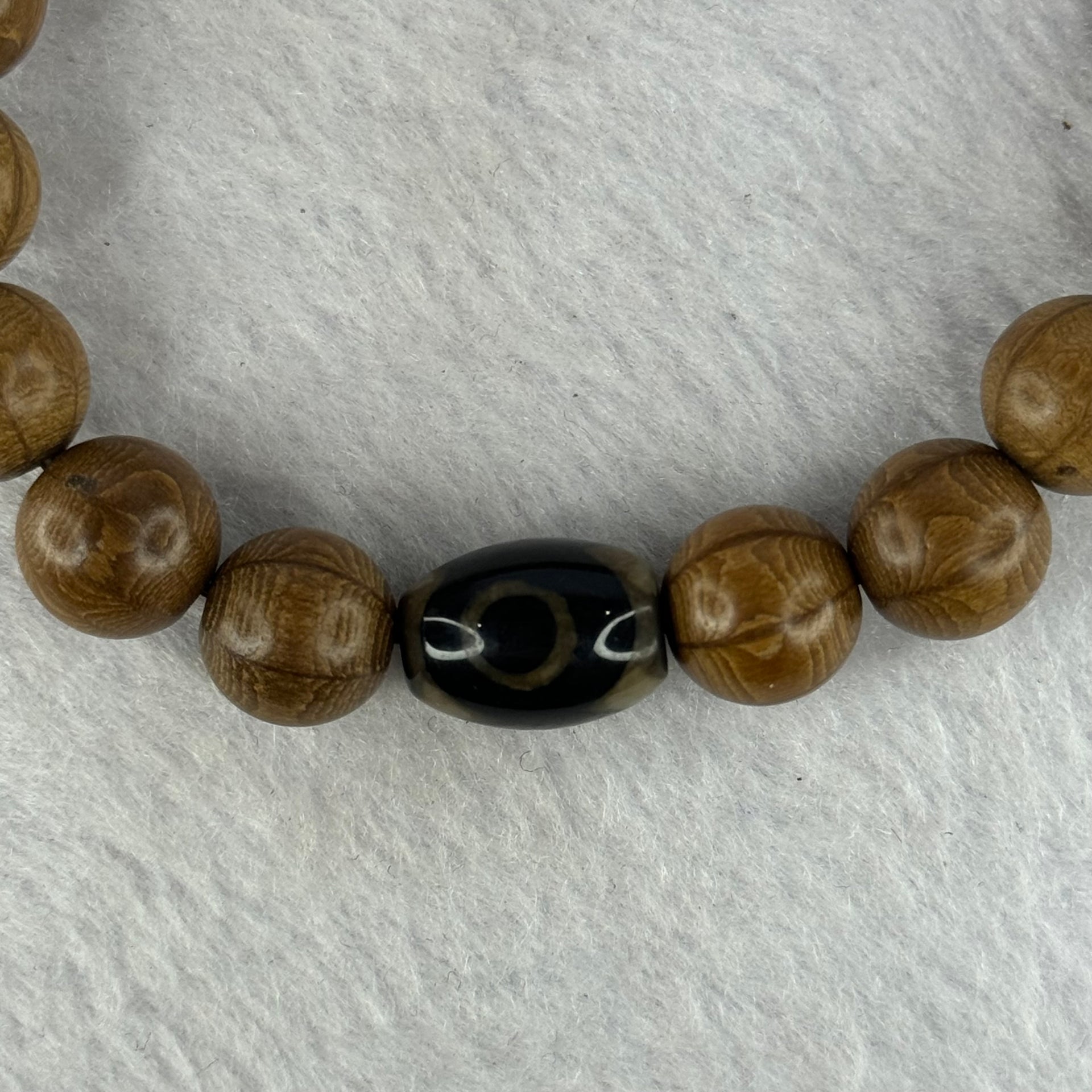 Natural Six Way Wooden Bead With 3 Eyes Dzi Bead Tian Zhu Beads Bracelets 天然六道木带三眼天珠手链 11.42g 16.5cm 10.5mm 18 Beads / 13.6 by 10.2mm 1 Bead - Huangs Jadeite and Jewelry Pte Ltd