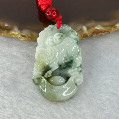 Type A Light Green with Blueish Green Piao Hua Jadeite Ox Pendent 8.83g 34.4 by 22.5 by 5.4mm