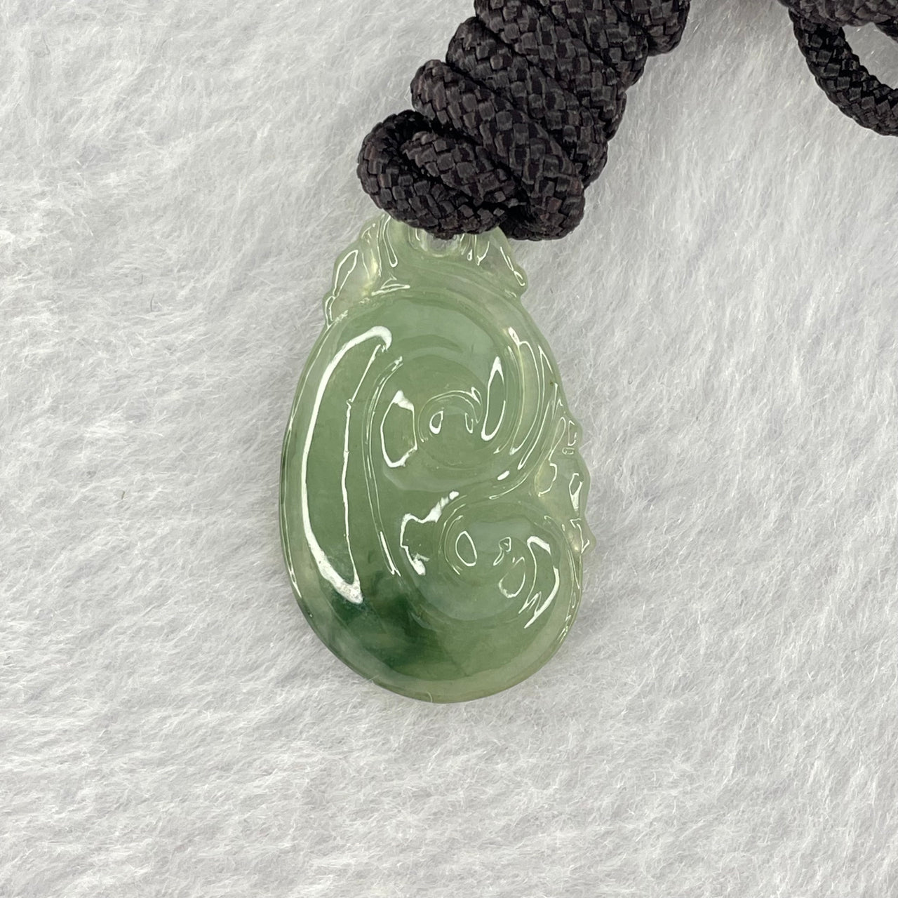 Type A Semi Icy Green with Blueish Green Patch Jadeite Ruyi Pendent 4.89g 27.1 by 16.8 by 4.5mm