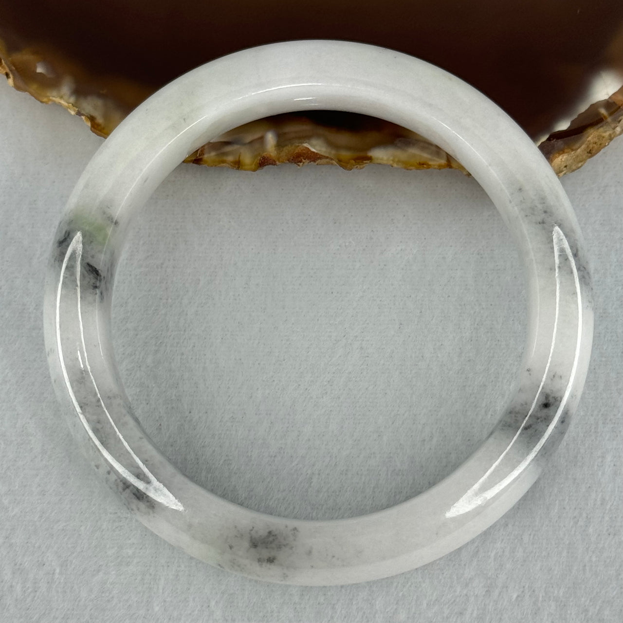 Type A Faint Lavender Green to White with Grey Wuji Patches Jadeite Bangle Internal Diameter 58.2mm 70.55g 14.0 by 9.3mm (Very Slight Internal Lines)