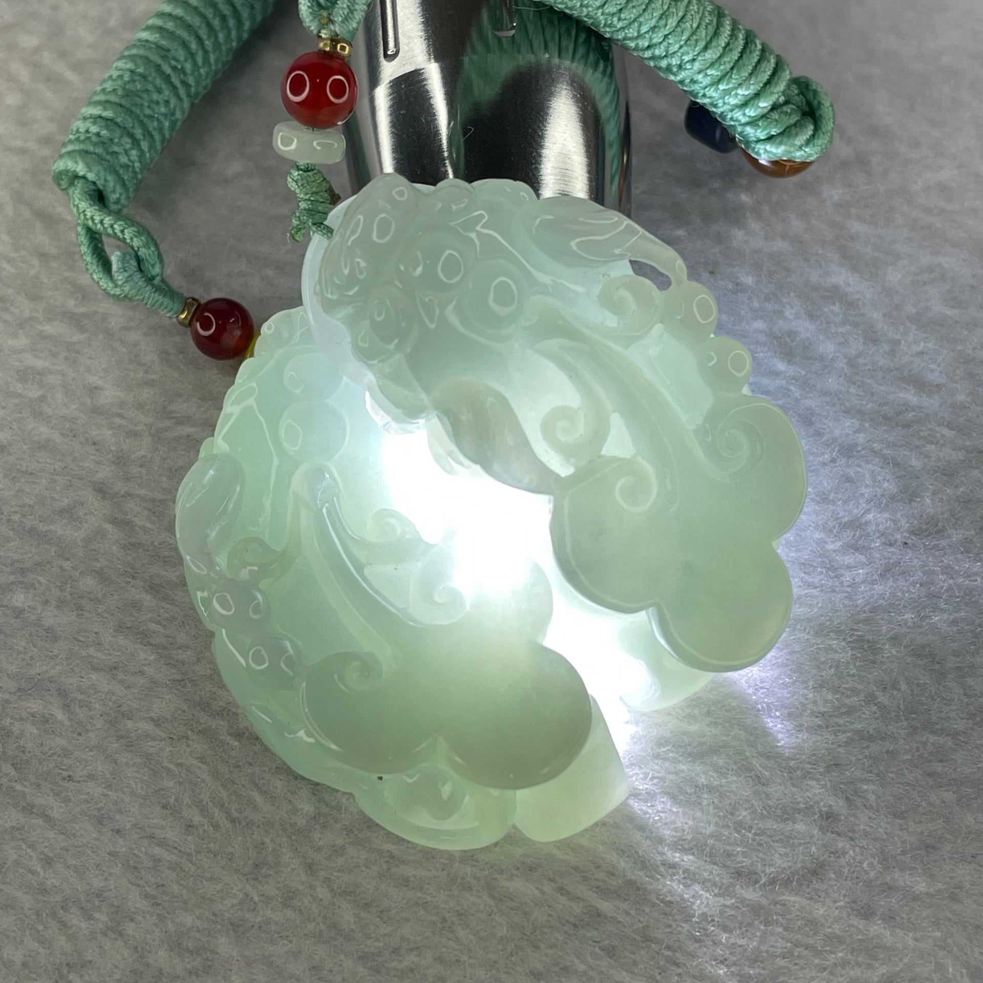 Type A Sky Blue Jadeite Pixiu Pair  40.26g 50.7 by 26.4 by 14.3 mm and 38.99g 49.7 by 25.3 by 14.2 mm - Huangs Jadeite and Jewelry Pte Ltd