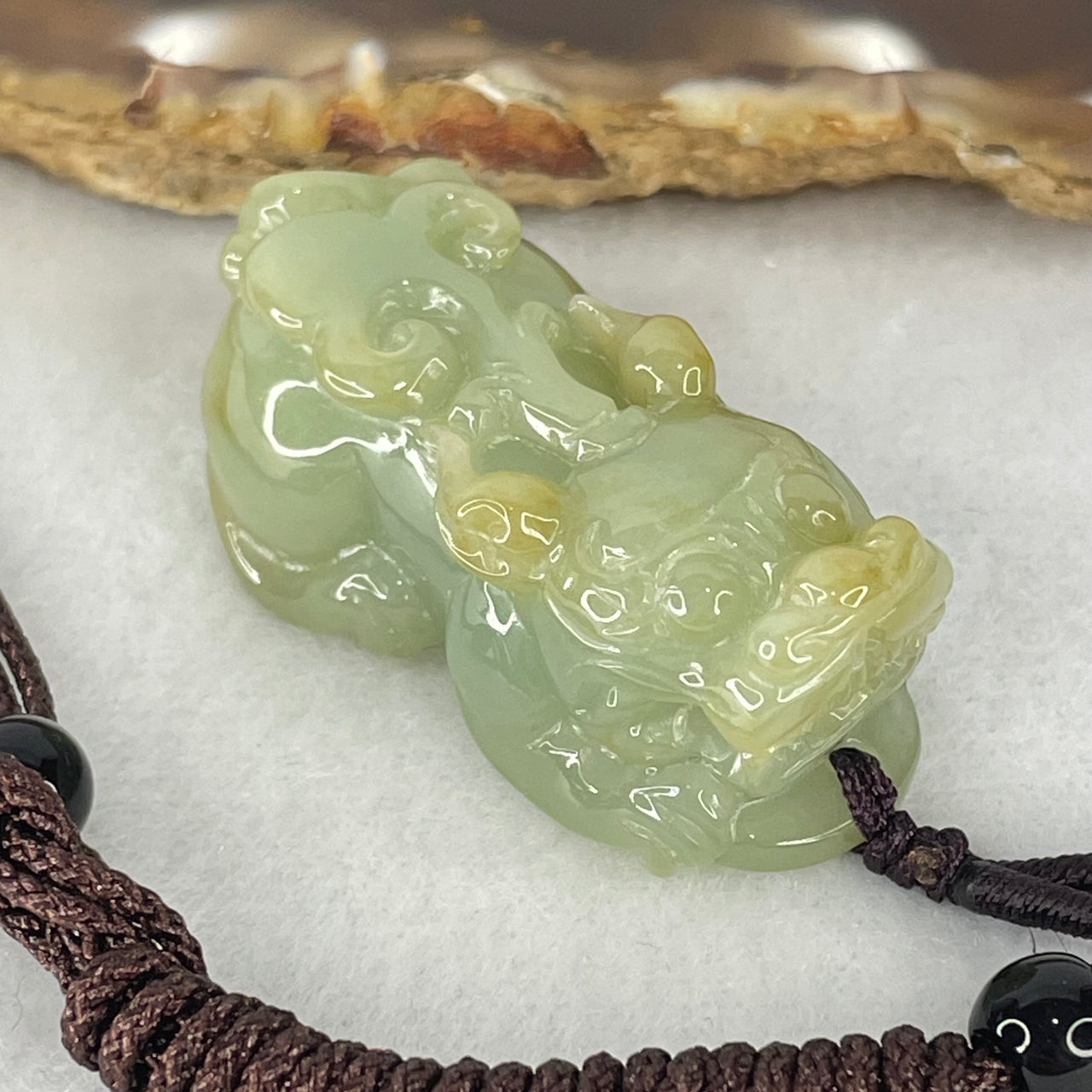 Type A Brownish Yellow Green Jadeite Pixiu Charm 22.33g 38.8 by 18.3 by 15.6mm