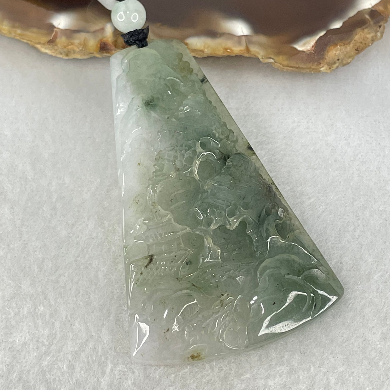 Type A Semi Icy Blueish Green Piao Hua and Faint Lavender Jadeite Shan Shui with Gui Ren Benefactor Pendant 25.20g 58.8 by 37.1 by 7.1mm