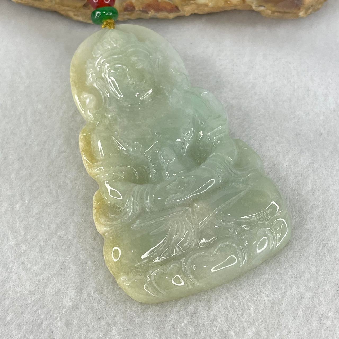 Type A Light Blueish Green with Yellow Jadeite Guan Yin Tara Pendant 29.14g 60.1 by 38.8 by 6.5mm