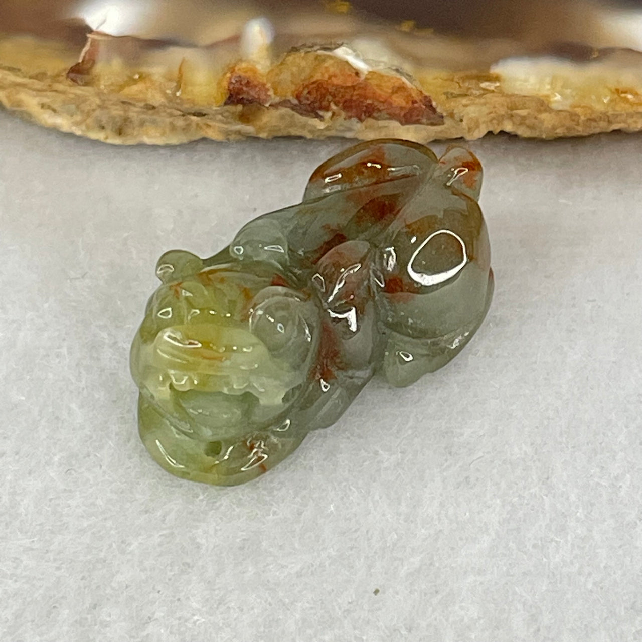 Type A Brownish Green Jadeite Pixiu Charm 6.56g 24.8 by 12.5 by 11.1mm