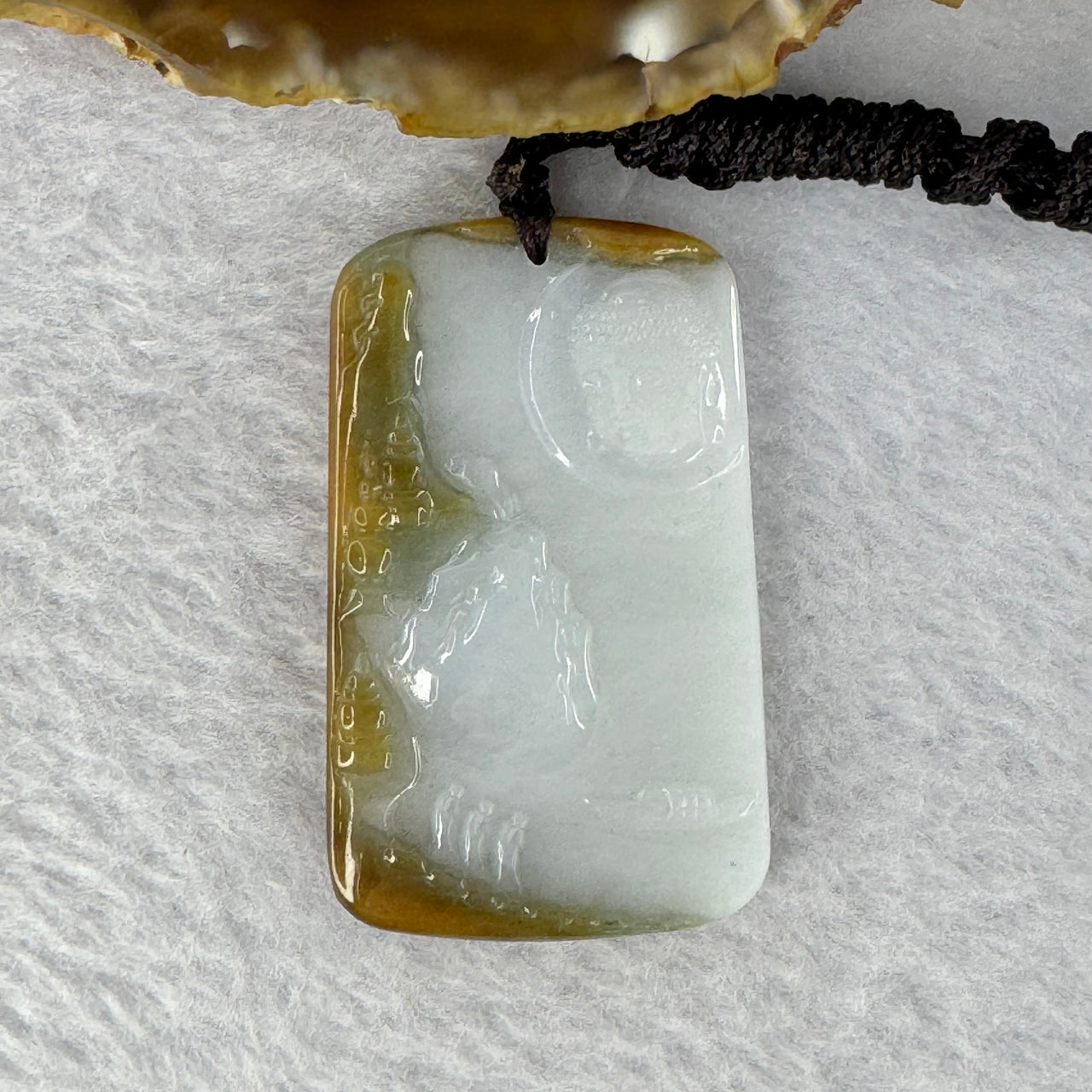 Type A Faint Lavender Green with Brown Patch Shan Shui with Buddha Pendent 25.00g 40.9 by 30.0 by 6.2 mm - Huangs Jadeite and Jewelry Pte Ltd