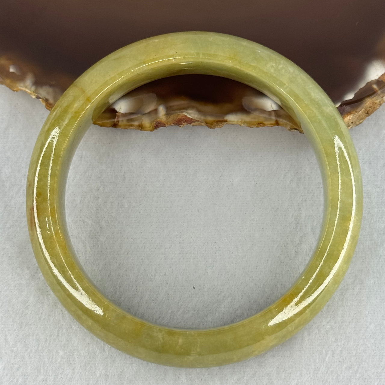 Type A Yellowish Green Jadeite Bangle Internal Diameter 55.8mm 65.38g 15.1 by 8.3mm (Slight External Line)