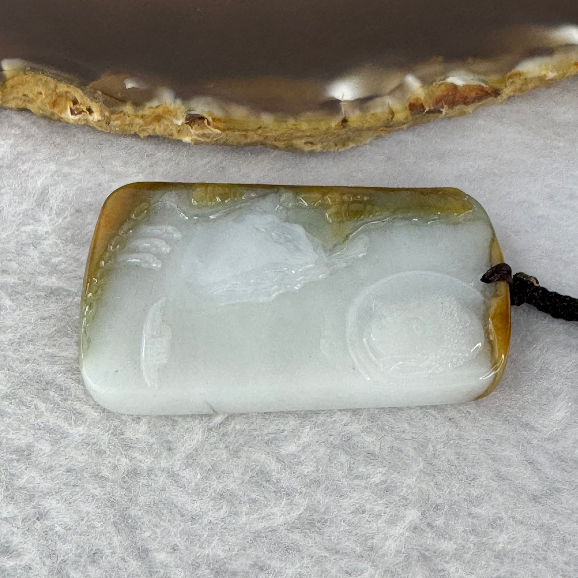 Type A Faint Lavender Green with Brown Patch Shan Shui with Buddha Pendent 25.00g 40.9 by 30.0 by 6.2 mm - Huangs Jadeite and Jewelry Pte Ltd