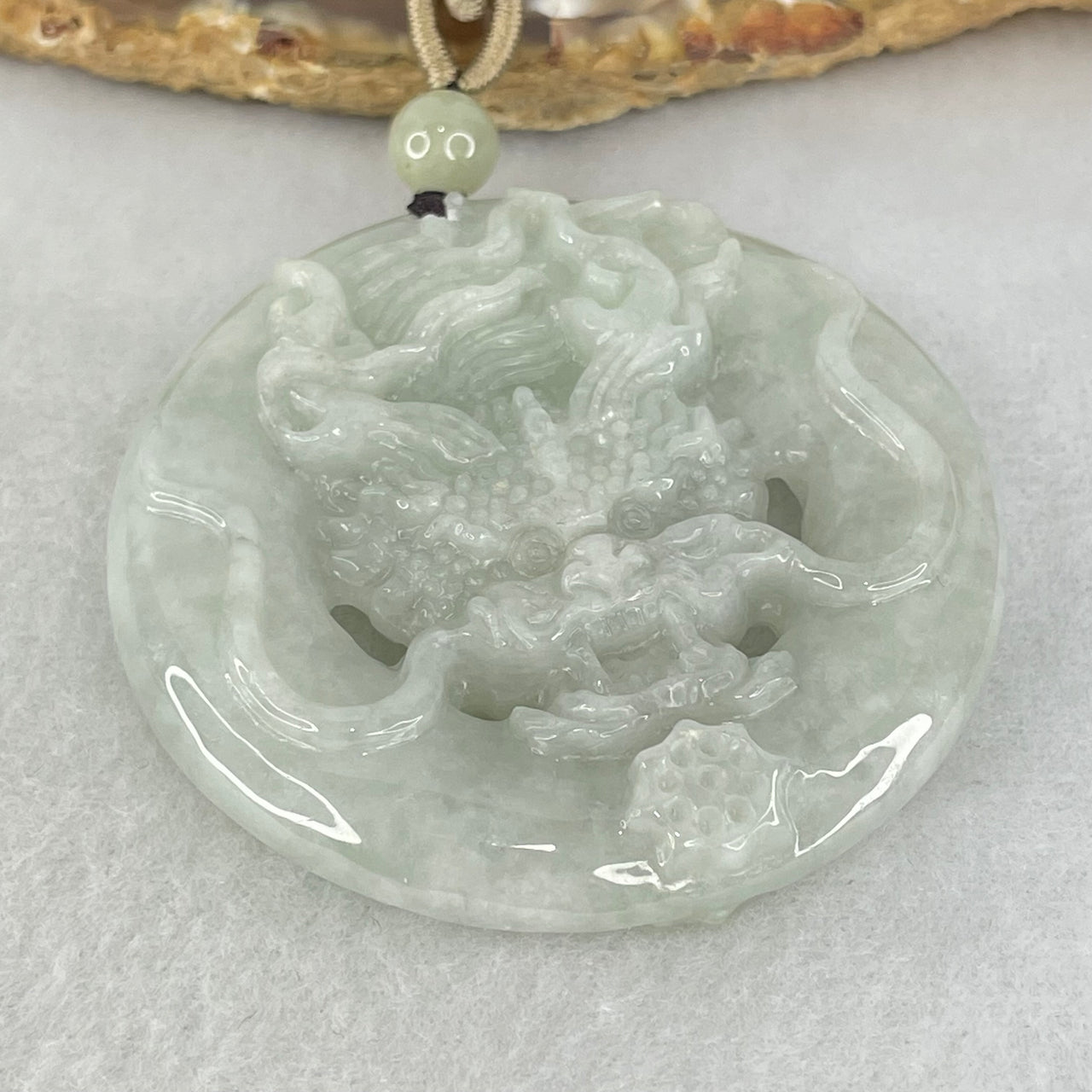 Type A Light Lavender Green Jadeite Double Sided Dragon Pendant 49.98g 51.9 by 10.9mm