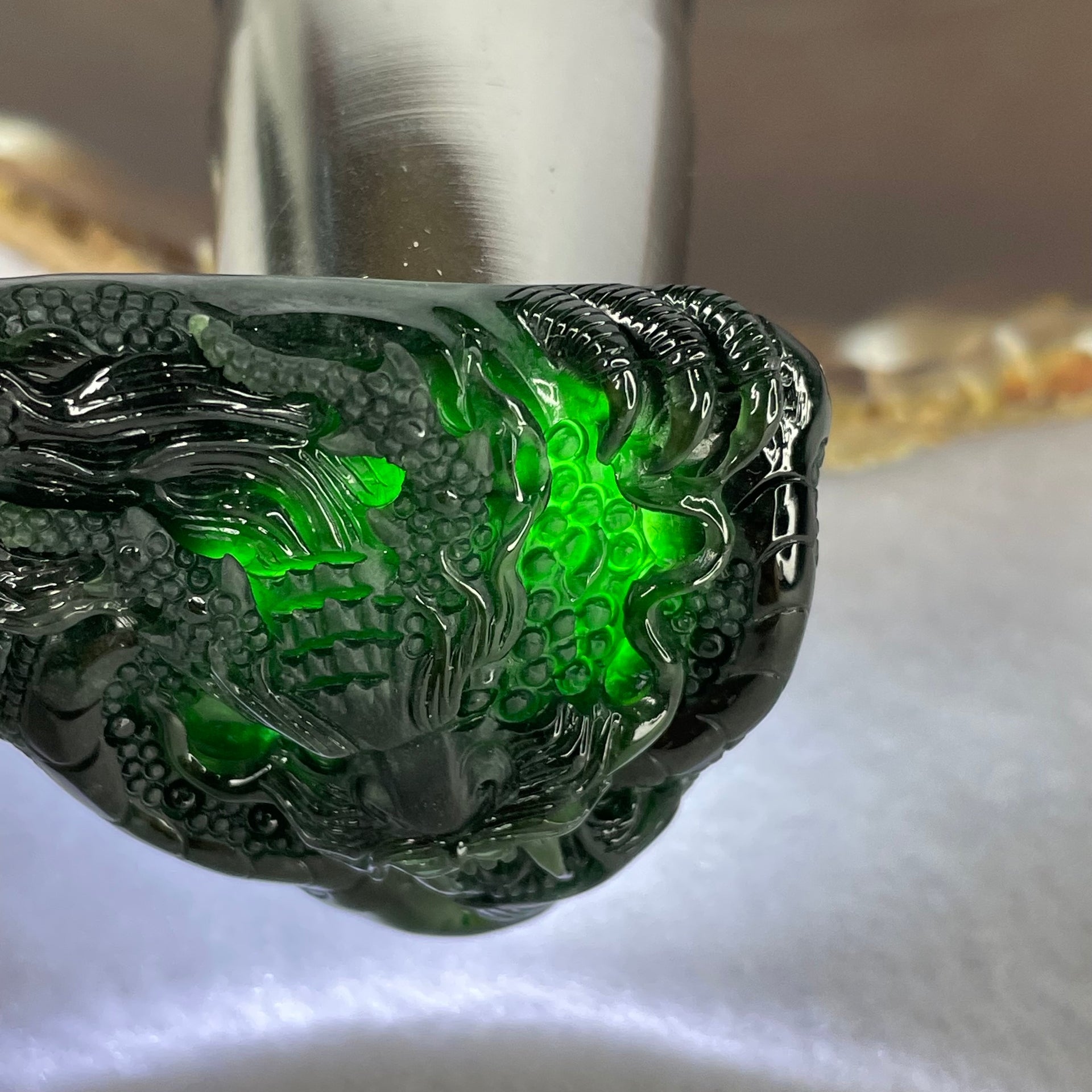 Rare High End Type A Fully Translucent Black Omphasite Jadeite Dragon (Shine Light is Dark Blueish Green) 罕见高端 A 货半透明黑色绿辉石翡翠龙  31.72g (Including String and 18K Hold Clasp) 53.75 by 40.40 by 9.65g with NGI Cert No. 82823872 - Huangs Jadeite and Jewelry Pte Ltd