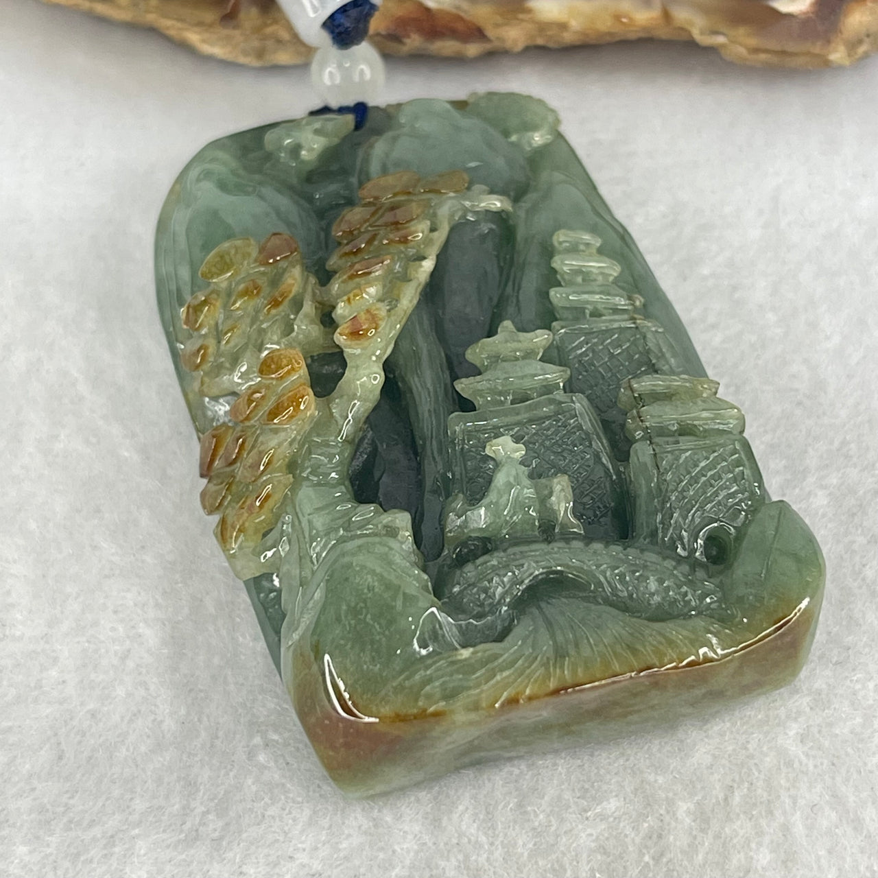 Type A Dark Blueish Green with Brown Patches Jadeite Double Sided Shan Shui with Gui Ren Benefactor Pendant 84.62g 58.0 by 39.1 by 19.4mm