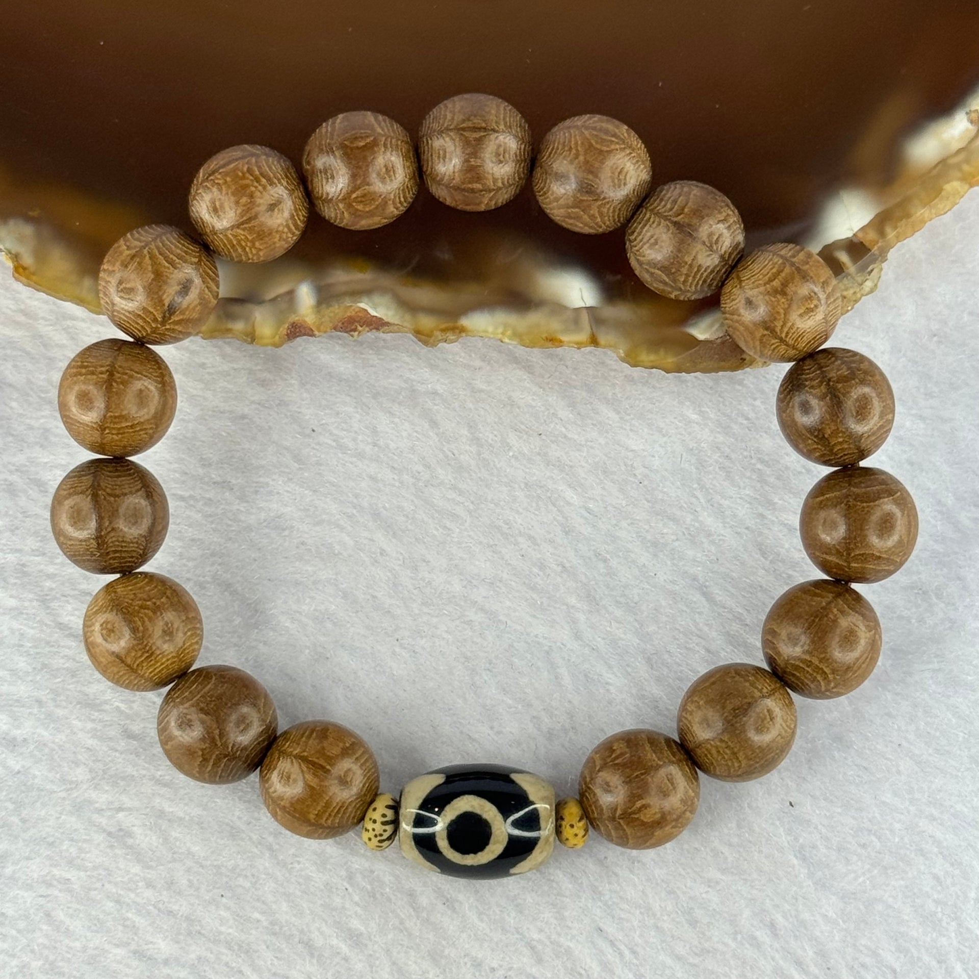 Natural Six Way Wooden Bead With 3 Eyes Dzi Bead Tian Zhu Beads Bracelets 天然六道木带三眼天珠手链 10.56g 16cm 10.3mm 17 Beads/ 13.8 by 10.1mm 1 Bead - Huangs Jadeite and Jewelry Pte Ltd