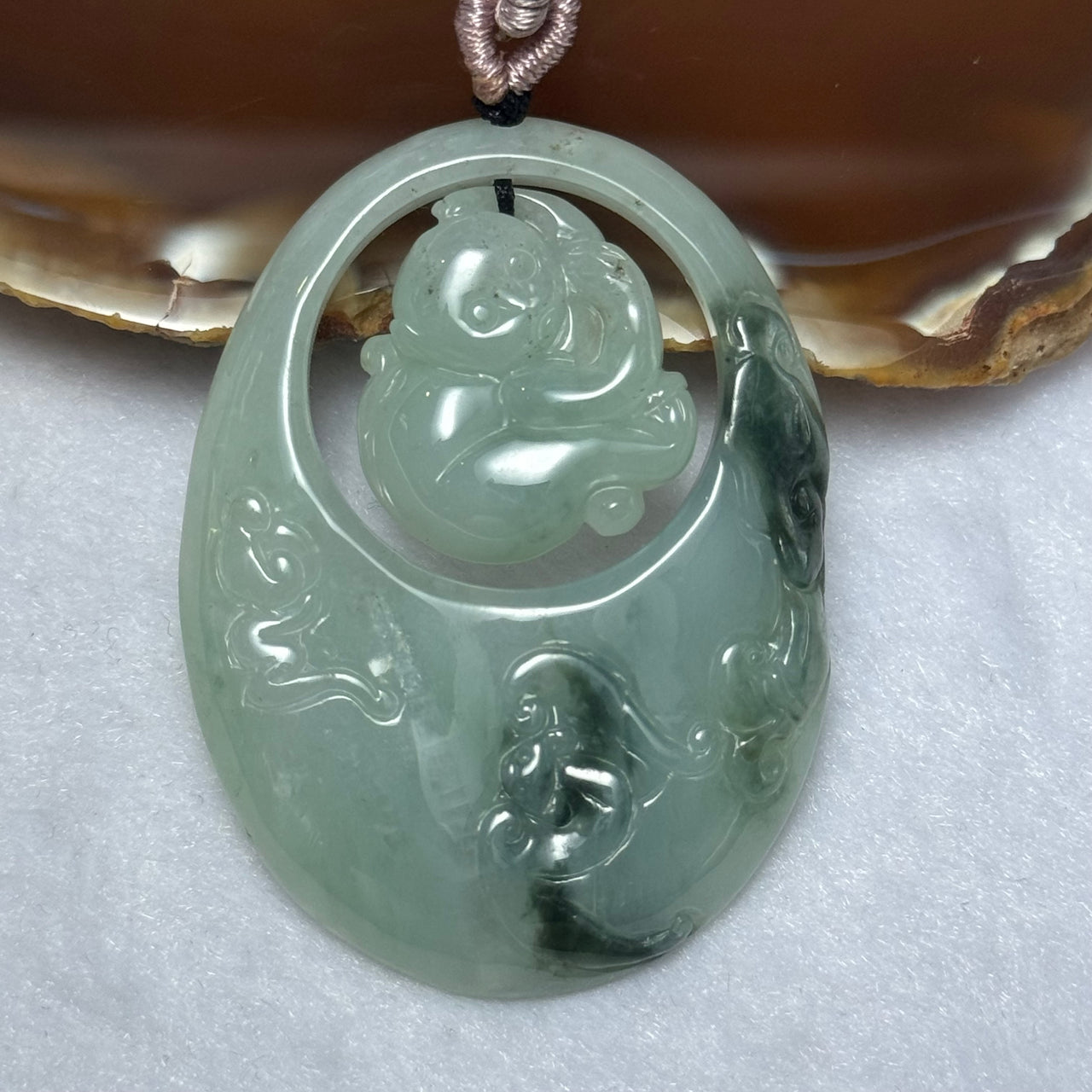 Type A Green Piao Hua Jadeite Monkey Pendent 25.79g 52.1 by 38.4 by 6.7mm - Huangs Jadeite and Jewelry Pte Ltd