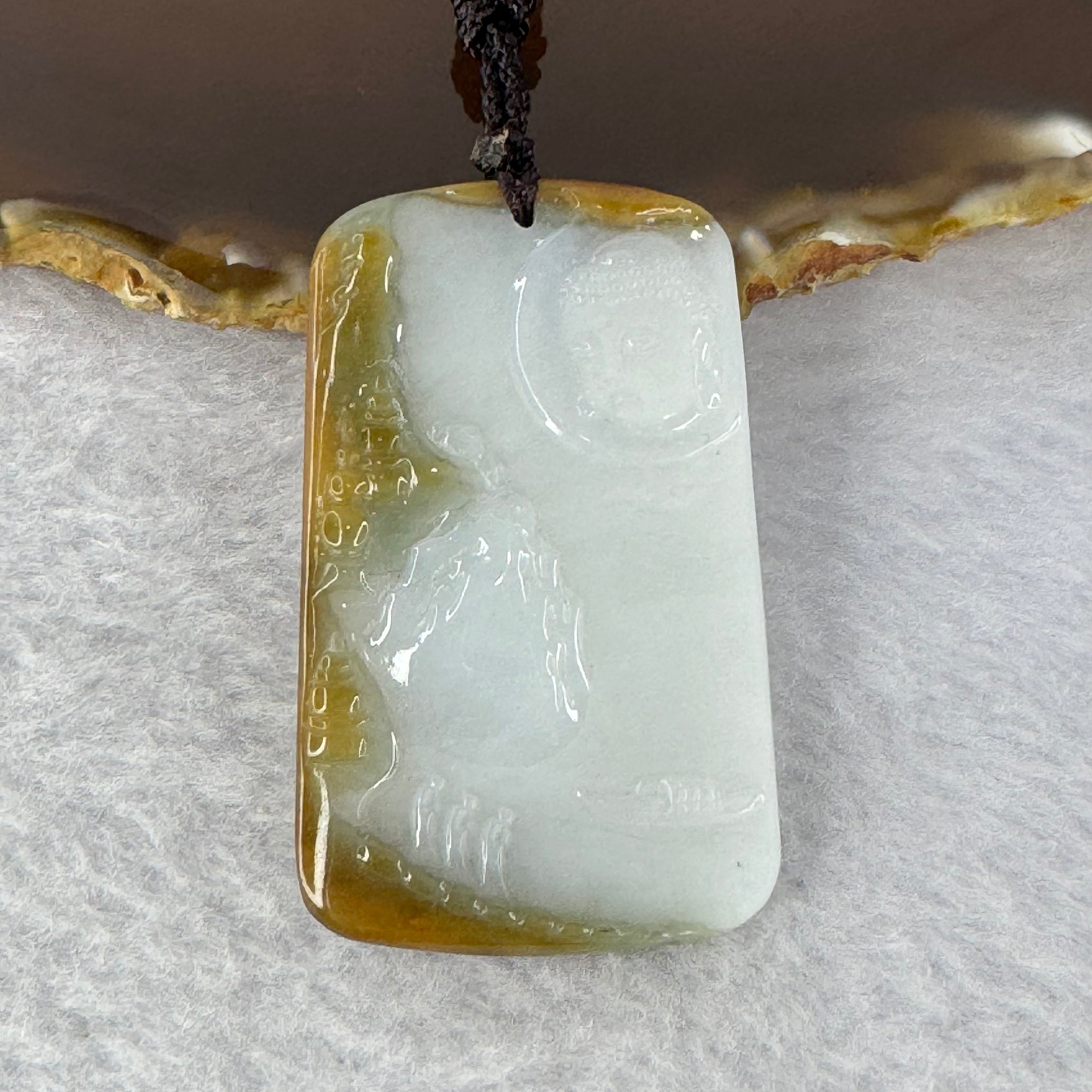 Type A Faint Lavender Green with Brown Patch Shan Shui with Buddha Pendent 25.00g 40.9 by 30.0 by 6.2 mm - Huangs Jadeite and Jewelry Pte Ltd