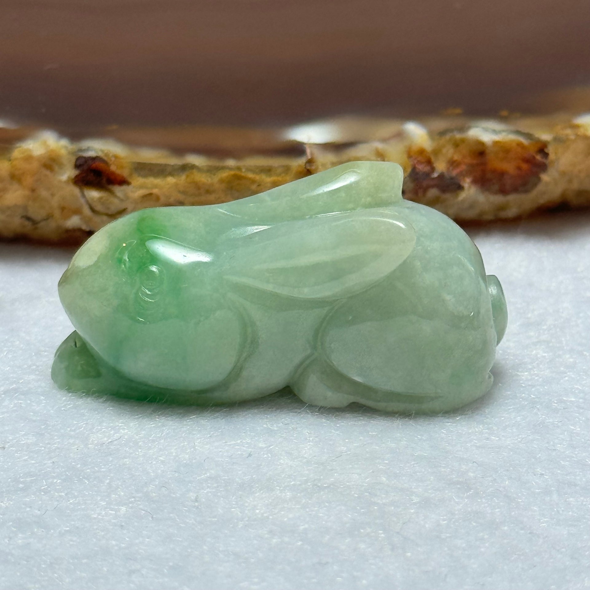 Type A Green with Spicy Piao Hua Jadeite Rabbit Charm 17.05g 36.0 by 14.2 by 17.6mm - Huangs Jadeite and Jewelry Pte Ltd