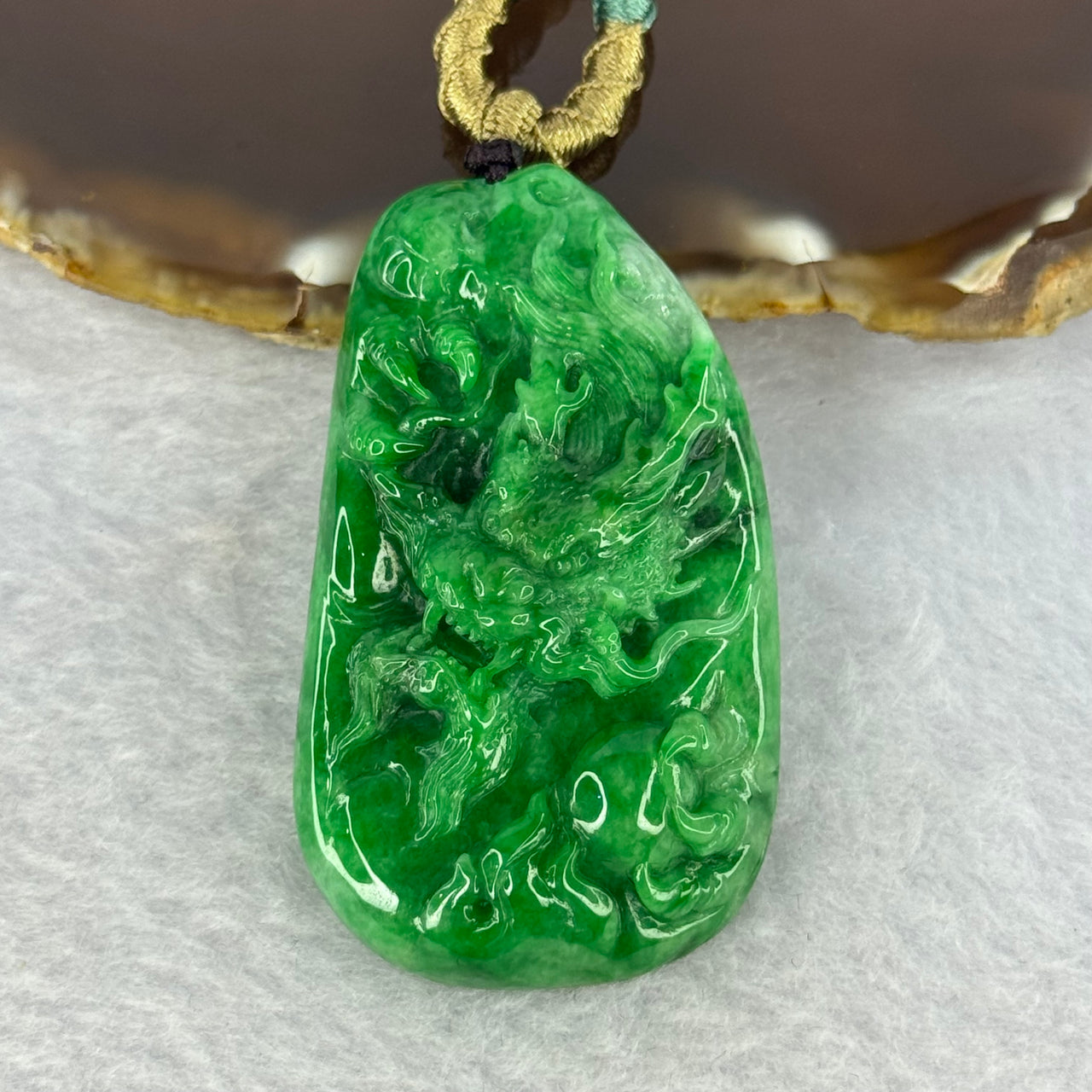 Grand Master Type A Spicy Green Jadeite Dragon 38.59g 54.6 by 31.6 by 11.3mm