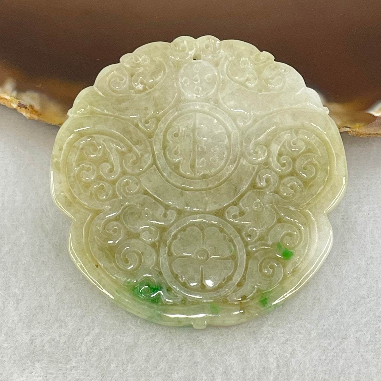 Type A Green with Faint Lavender Patches Jadeite Ruyi Pendant 27.84g 51.1 by 4.7mm