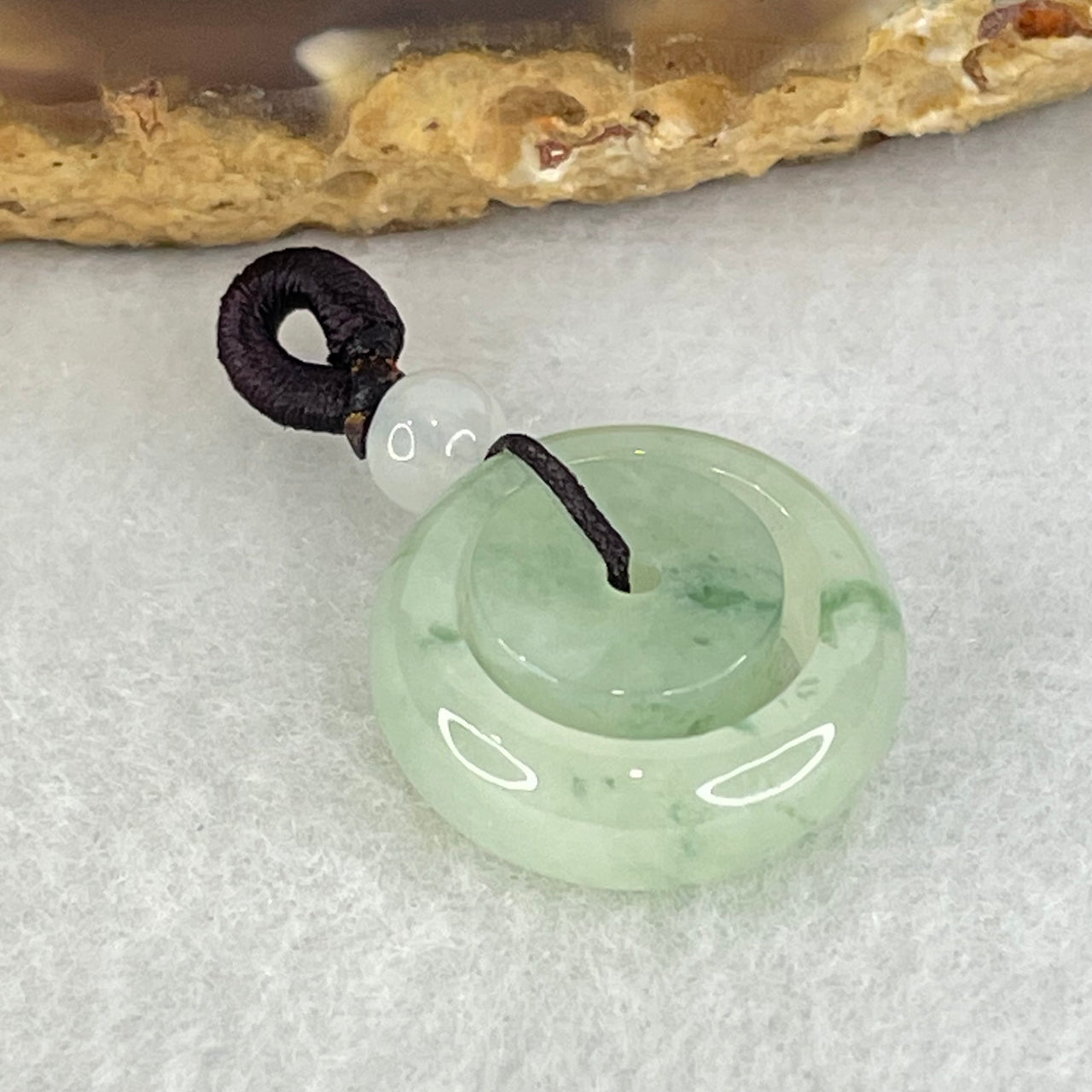 Type A Light Green with Blueish Green Piao Hua Jadeite Ping An Kou Donut Charm Pendant 4.56g 18.1 by 6.7mm