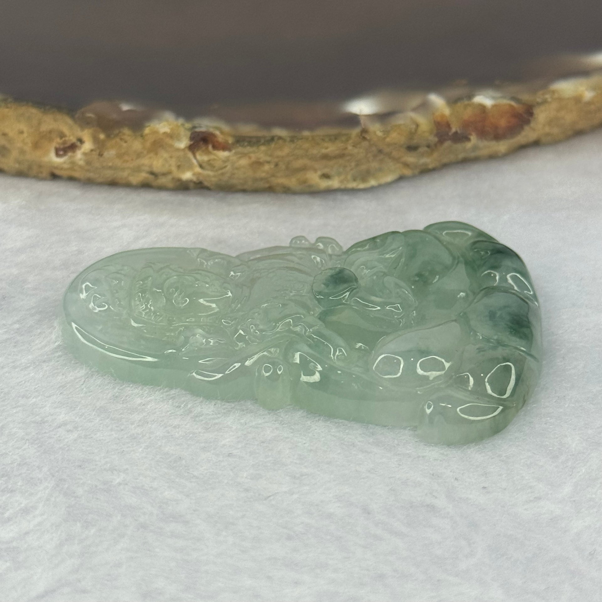 Certified Grandmaster Type A Icy Jelly Green with Dark Blueish Green Piao Hua Jadeite Guan Yin Pendent 18.74g 50.3 by 34.2 by 6.6mm - Huangs Jadeite and Jewelry Pte Ltd