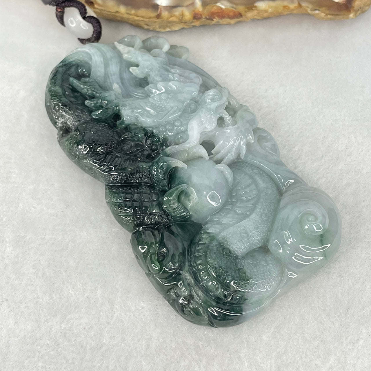 Type A Light Green Light Lavender and Dark Green Jadeite Double Sided Dragon Pendant 87.12g 77.6 by 43.2 by 13.4mm