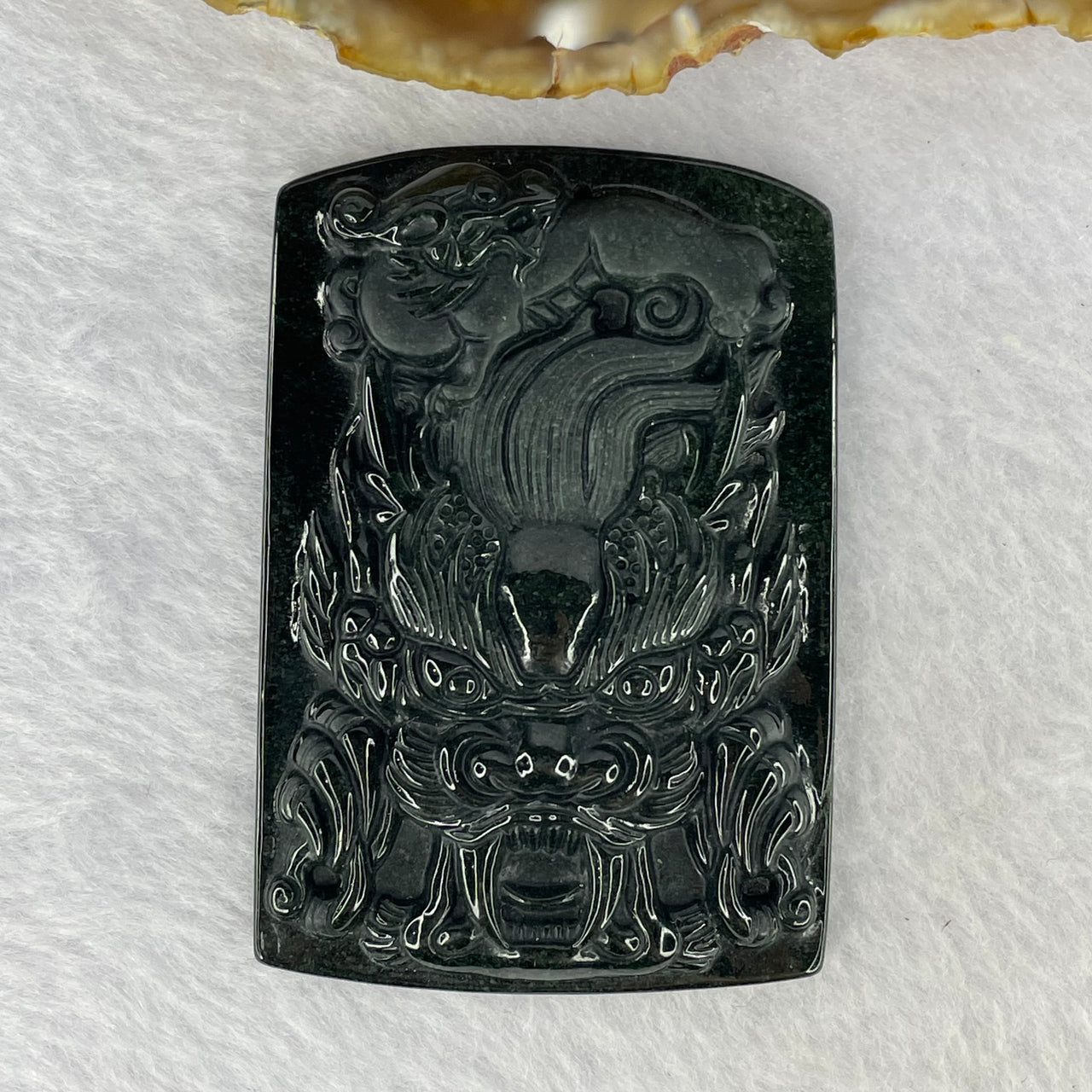 Type A Partial Translucent Black Omphasite Dragon and Baby Dragon Pendent A货墨翠笼饺子牌 42.72g 67.0 by 45.7 by 9.0 mm - Huangs Jadeite and Jewelry Pte Ltd