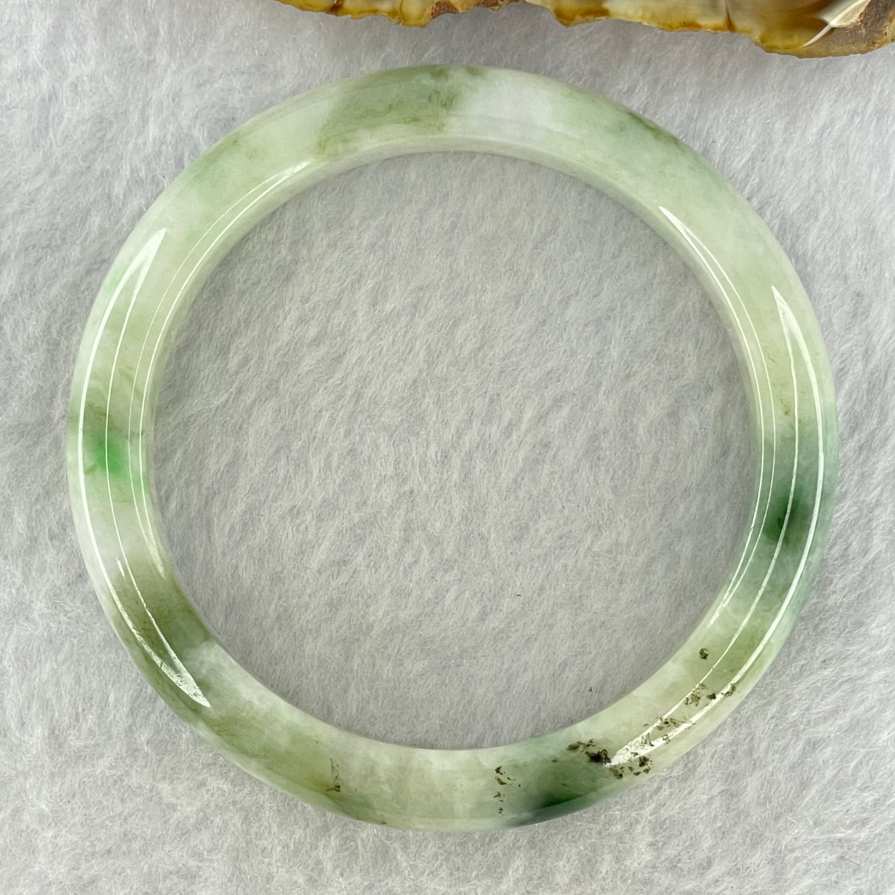 Type A Light Green with Moss Green Piao Hua Jadeite Bangle Internal Diameter 55.6mm 41.97g 10.4 by 7.6mm ( Very Slight External Rough + Internal Lines)