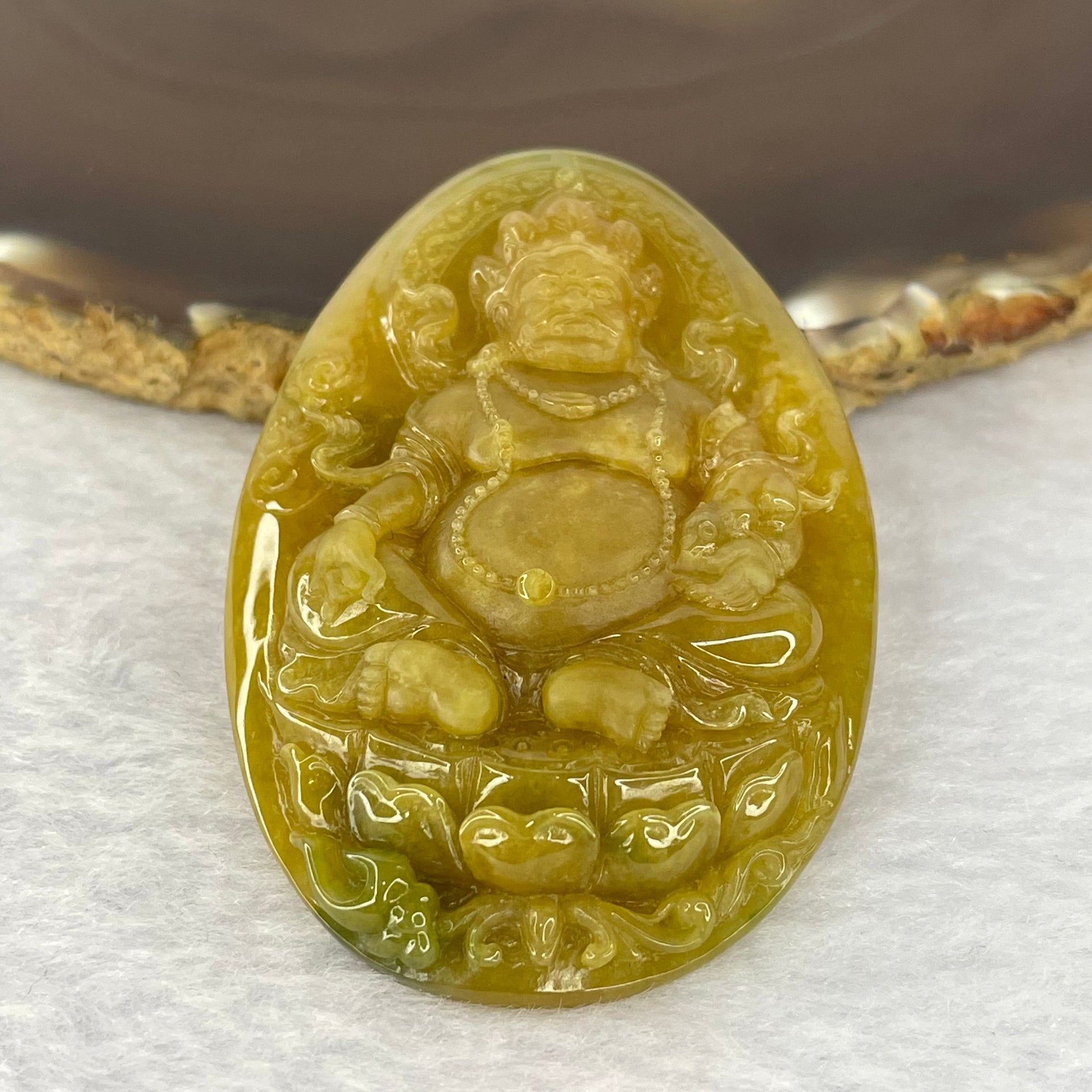 Grand Master Very Translucent Type A Yellow Jadeite Huang Cai Shen 黄财神 Yellow Jambhala 36.99g 62.6 by 40.8 by 10.8mm with Wooden Stand - Huangs Jadeite and Jewelry Pte Ltd