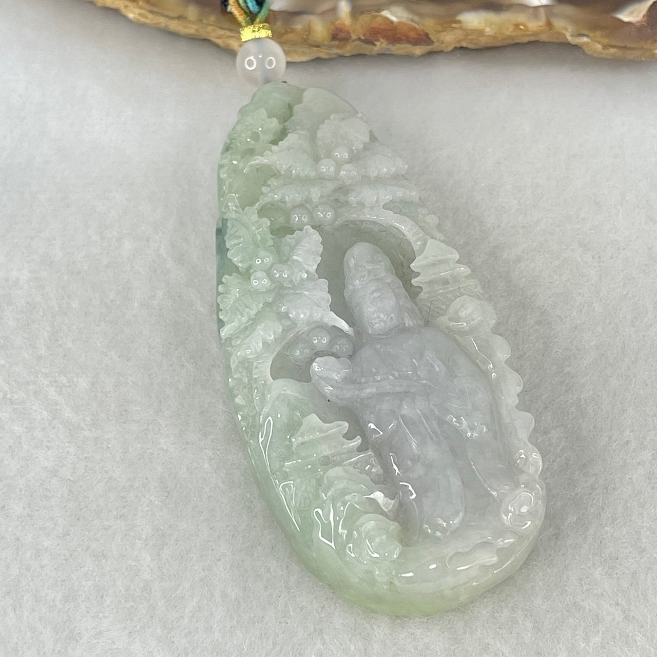 Type A Light Lavender Green Jadeite Shan Shui with Guan Yin Pendant 54.92g 70.9 by 30.6 by 13.2mm