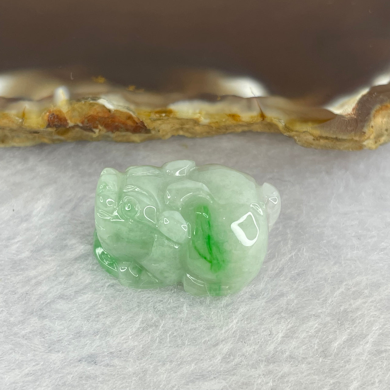 Type A Bright Green with Faint Lavender Jadeite Pixiu Pendent A货辣绿和浅紫罗兰翡翠貔貅吊坠 8.32g 22.8 by 16.2 by 12.0 mm - Huangs Jadeite and Jewelry Pte Ltd