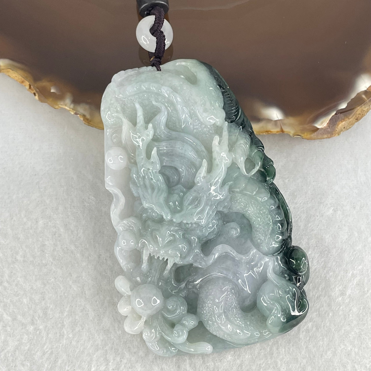 Type A Light Green and Light Lavender with Dark Blueish Green Patch Jadeite Double Sided Dragon Pendant 83.46g 74.4 by 48.5 by 13.3mm