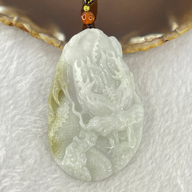 Type A Faint Lavender Green with Brown Patch Jadeite Dragon Pendant 53.17g 67.9 by 43.0 by 12.1mm