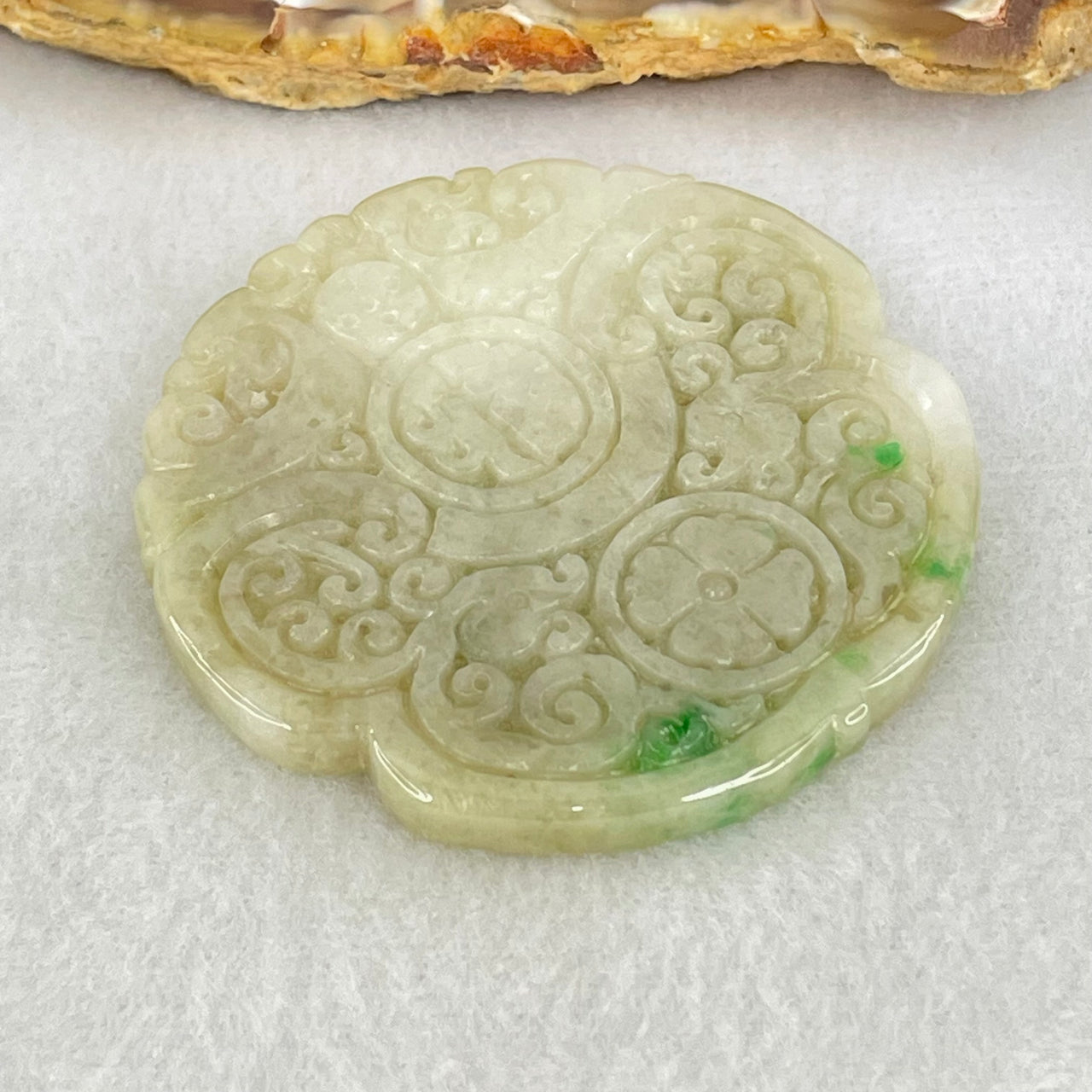 Type A Green with Faint Lavender Patches Jadeite Ruyi Pendant 27.84g 51.1 by 4.7mm