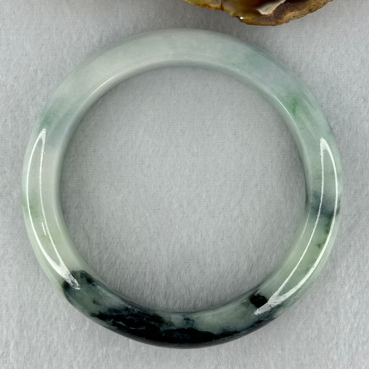 Type A Light Green with Dark Green Patches Jadeite Bangle Internal Diameter 58.0mm 68.19g 13.8 by 9.0mm (Slight External Rough)