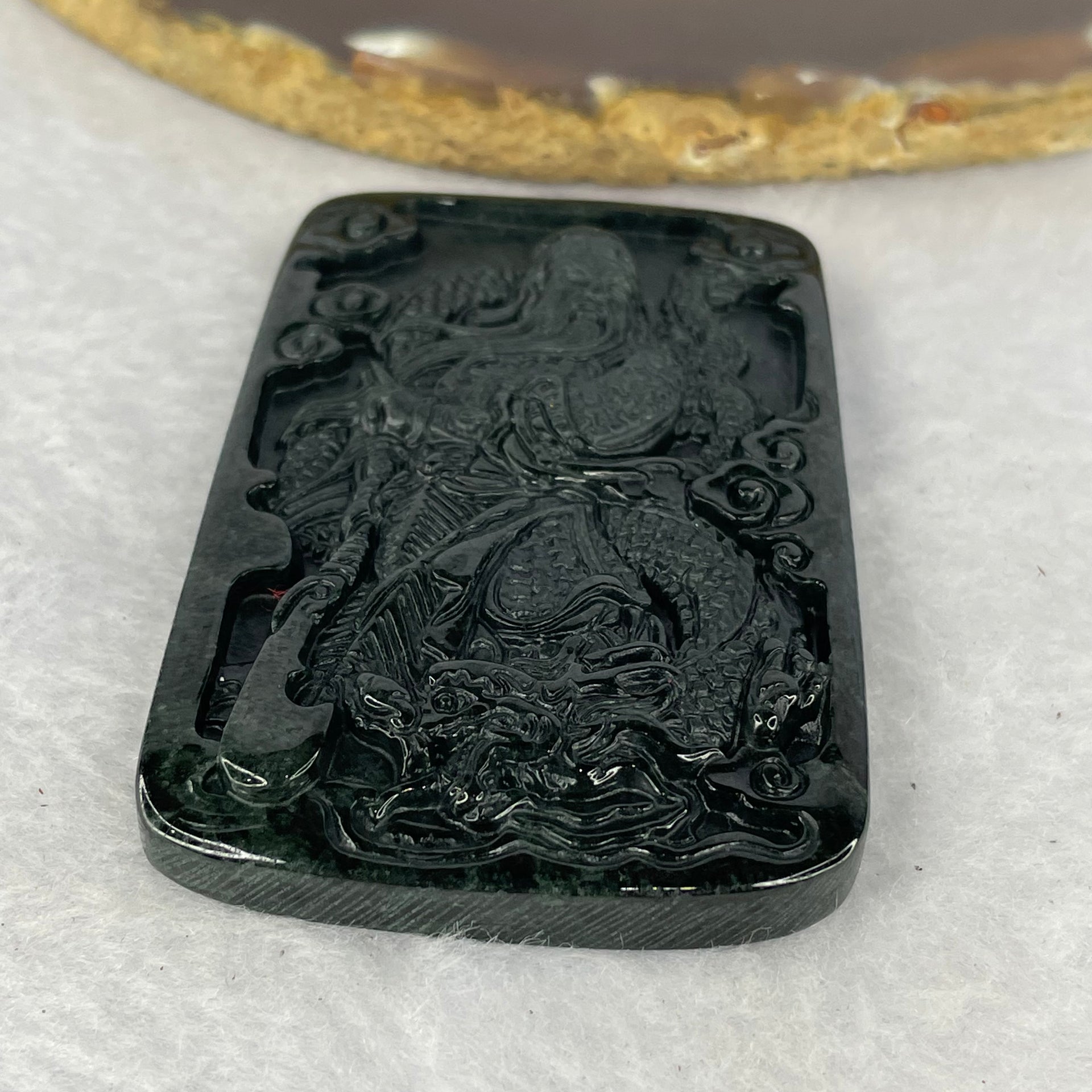 Type A Partial Translucent Black Omphasite Jadeite Guan Gong with Dragon Pendent A货部分半透明黑色绿辉石翡翠关公龙吊坠 35.15g 66.6 by 44.6 by 7.4 mm - Huangs Jadeite and Jewelry Pte Ltd