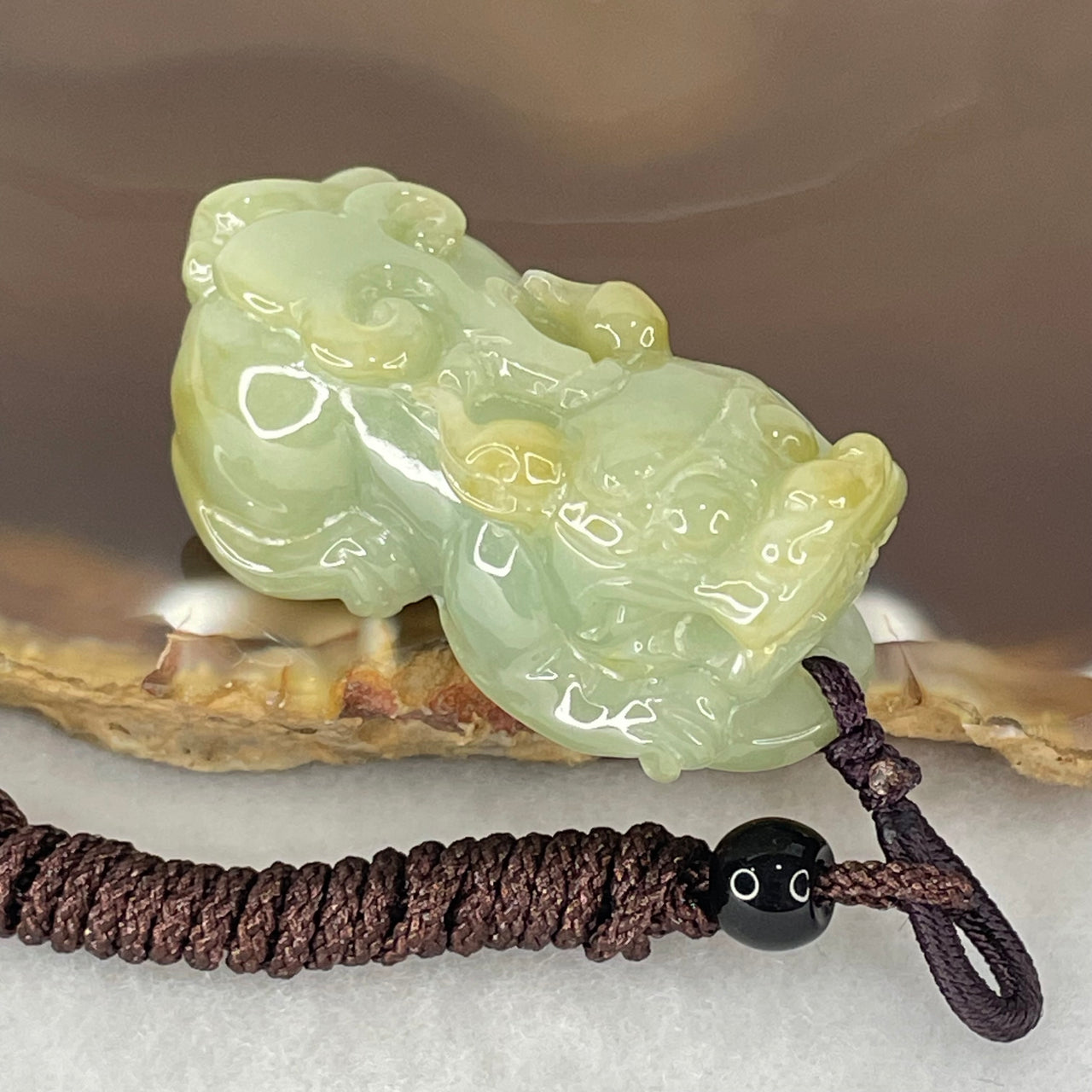 Type A Brownish Yellow Green Jadeite Pixiu Charm 22.33g 38.8 by 18.3 by 15.6mm