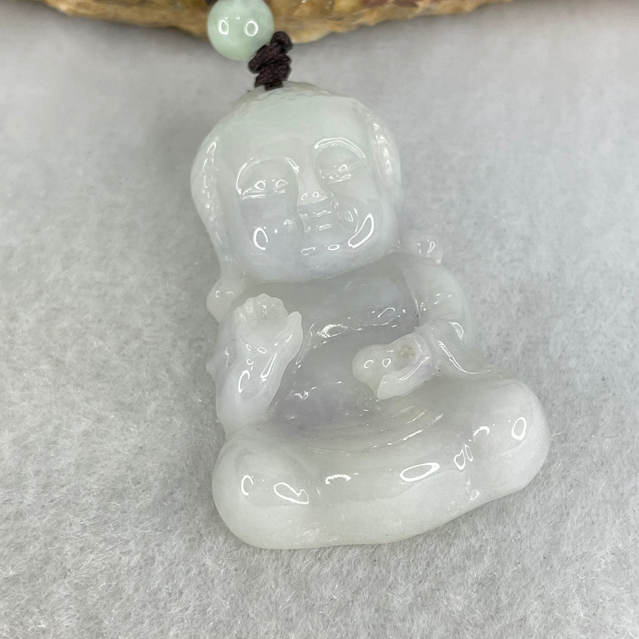 Type A Light Lavender Green Jadeite Baby Buddha Pendant 13.84.g 40.1 by 26.7 by 8.8mm