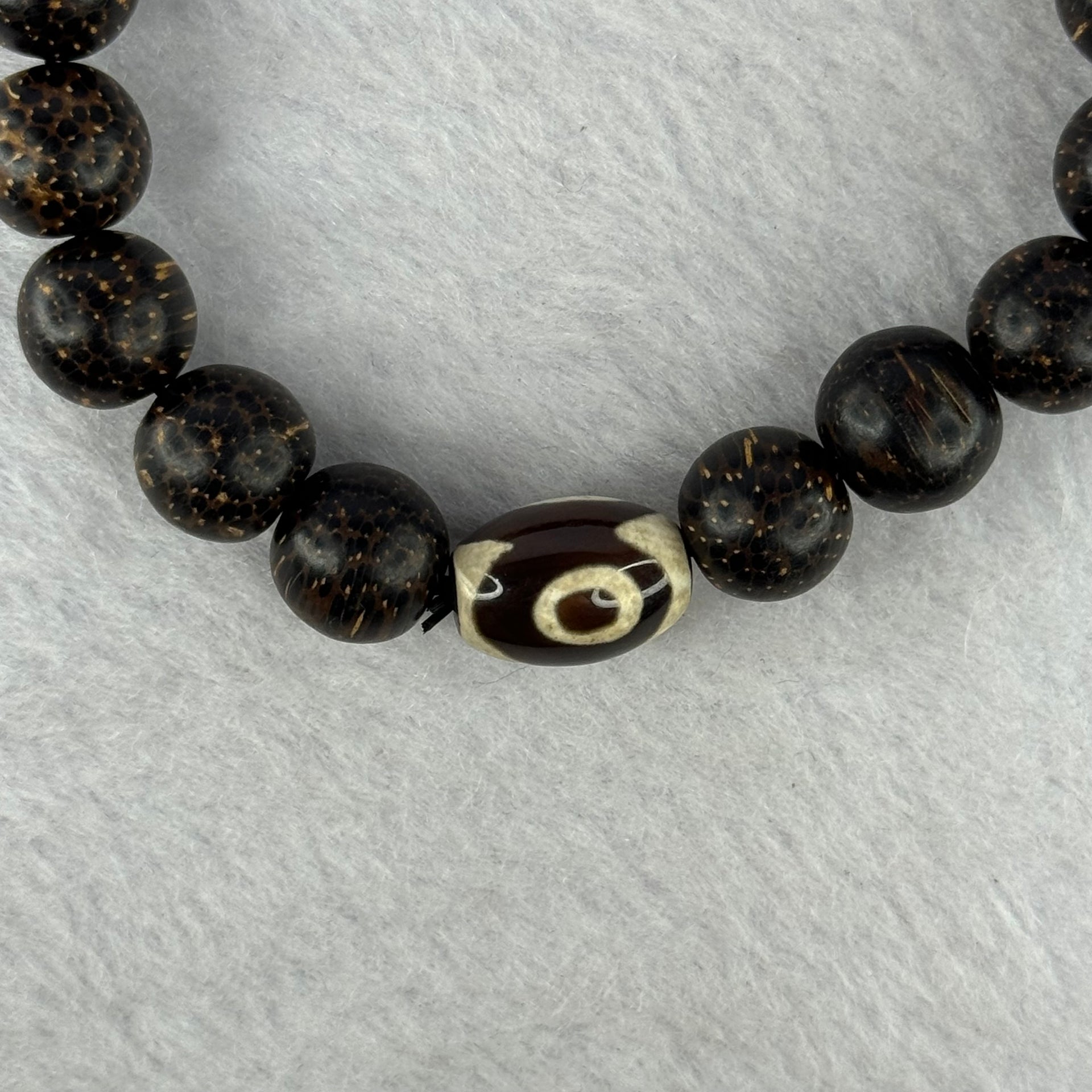 Natural Agarwood With 3 Eyes Dzi Bead Tian Zhu Beads Bracelet 天然沉香带三眼天珠手链 17.70g 16.5cm Dzi 14.4 by 10.1 and 14.0mm 1 Bead and 10.8mm 16 Beads - Huangs Jadeite and Jewelry Pte Ltd