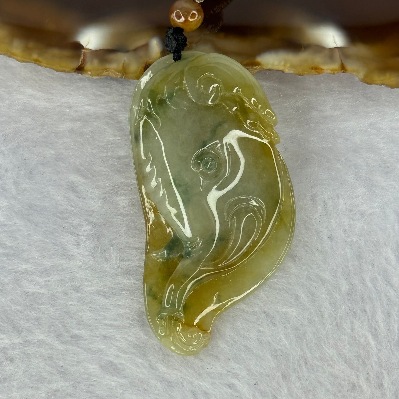 Type A Brownish Yellow with Green Jadeite Elephant With Leaf Pendent 13.37g 41.3 by 21.6 by 9.0mm