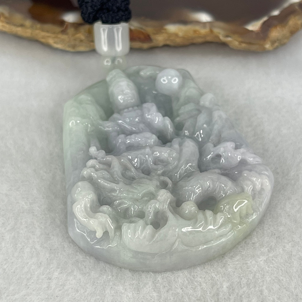 Type A Light Lavender Green Jade Jadeite Guan Yin on Dragon Pendant 38.44g 52.8 by 45.0 by 12.2mm