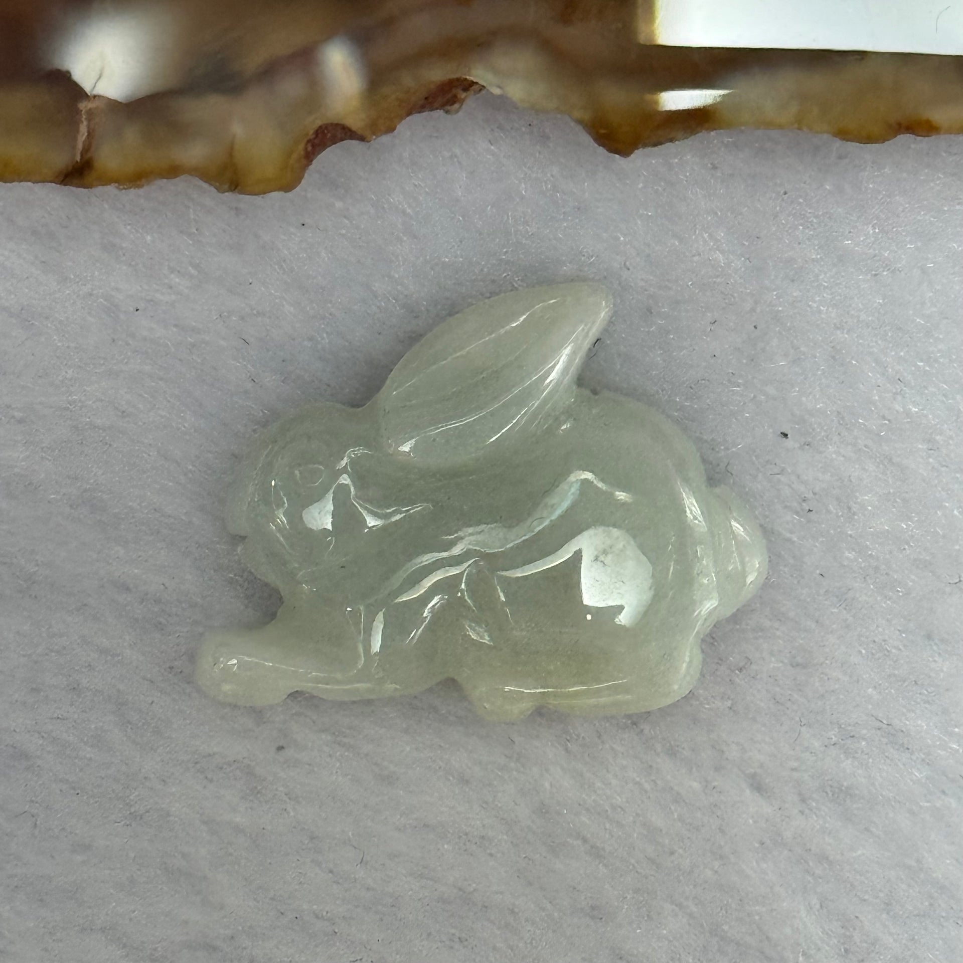 Type A Faint Green Lavender Yellow Jadeite Rabbit Pendant 5.13g 22.5 by 8.0 by 17.9mm - Huangs Jadeite and Jewelry Pte Ltd