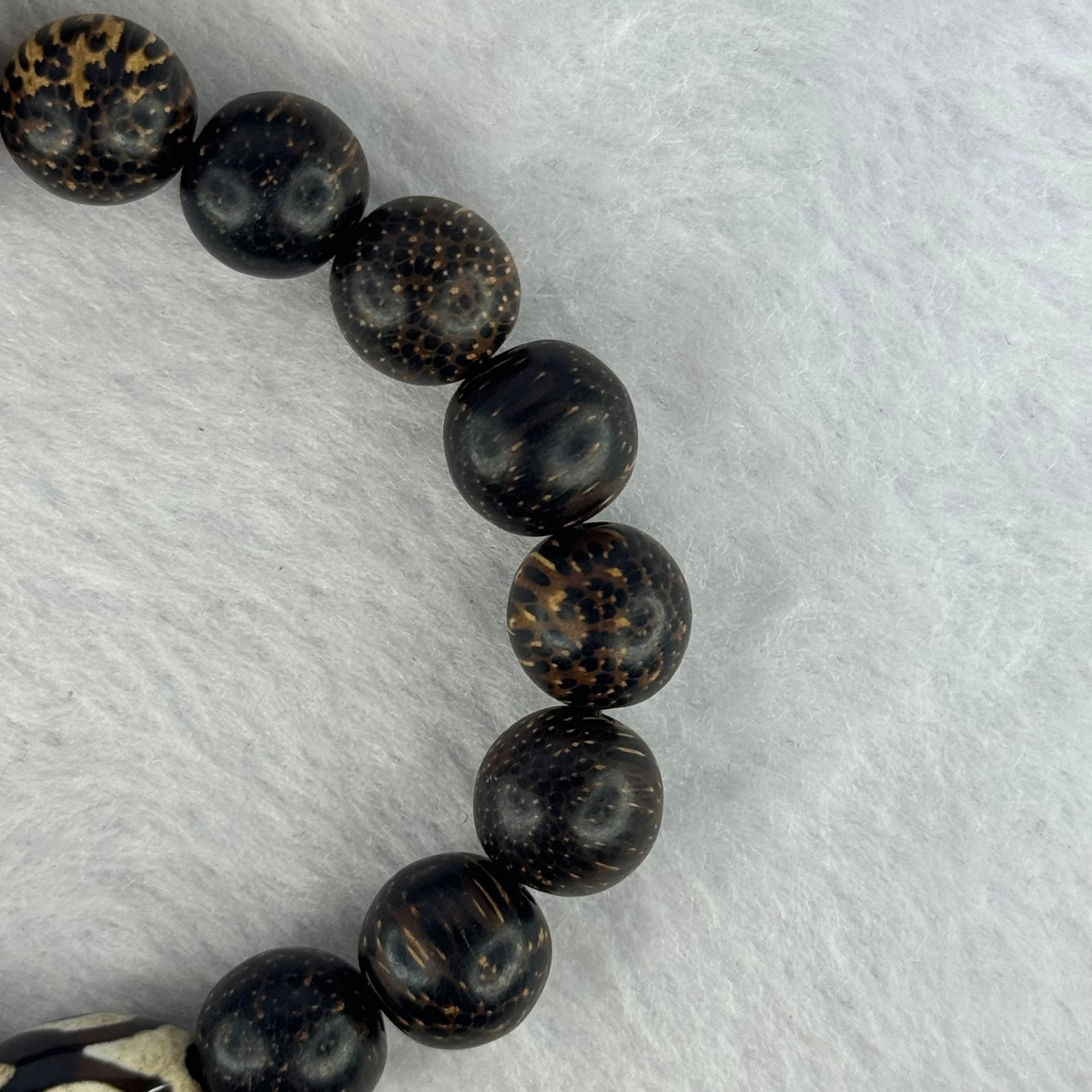 Natural Agarwood With 3 Eyes Dzi Bead Tian Zhu Beads Bracelet 天然沉香带三眼天珠手链 17.61g 16.5cm Dzi 14.1 by 10.6 and 13.9mm 1 Bead and 10.9mm 16 Beads - Huangs Jadeite and Jewelry Pte Ltd