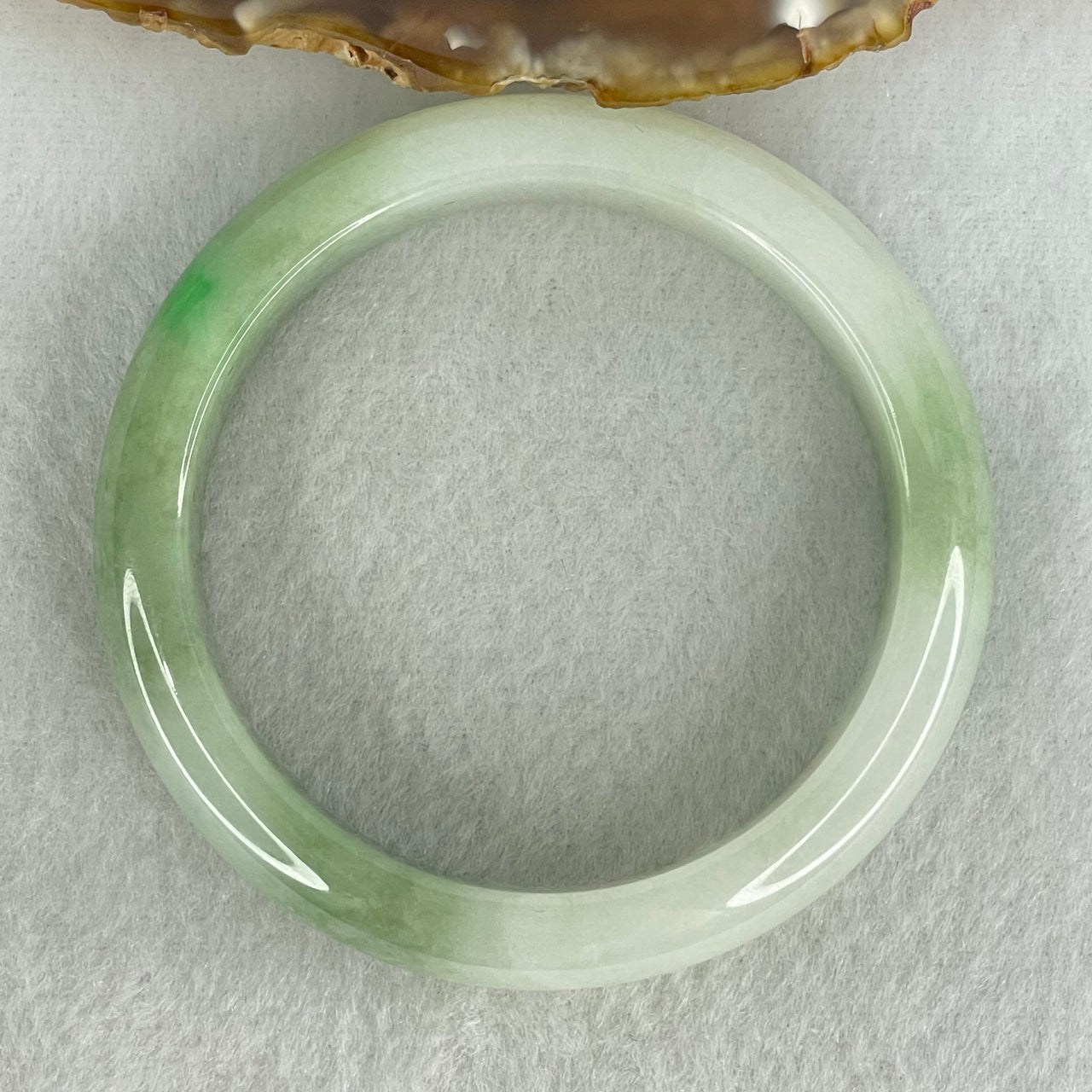 Type A Light Green with Green Patches Jadeite Bangle Internal Diameter 53.8mm 50.57g 12.3 by 7.9mm (Internal Lines)