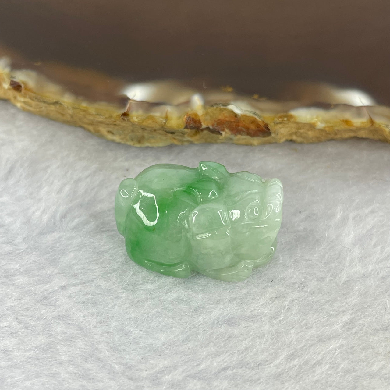 Type A Bright Green with Faint Lavender Jadeite Pixiu Pendent A货辣绿和浅紫罗兰翡翠貔貅吊坠 8.85g 23.0 by 14.8 by 12.1 mm - Huangs Jadeite and Jewelry Pte Ltd