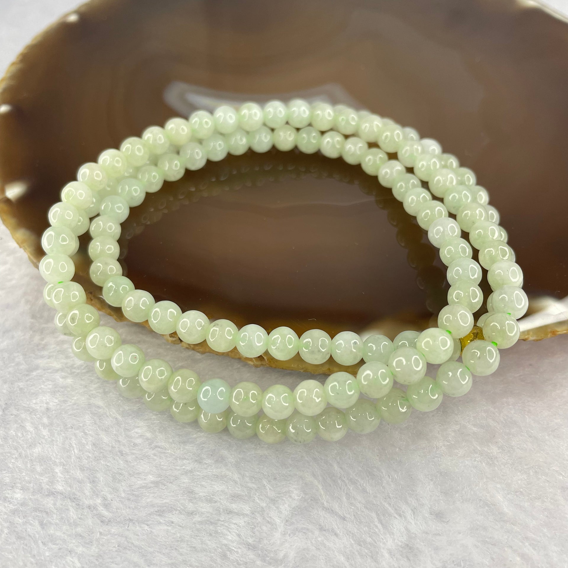 Type A Semi Icy Green with Wuji Grey Piao Hua Beads Necklace 125 Beads 5.5mm 32.88g - Huangs Jadeite and Jewelry Pte Ltd