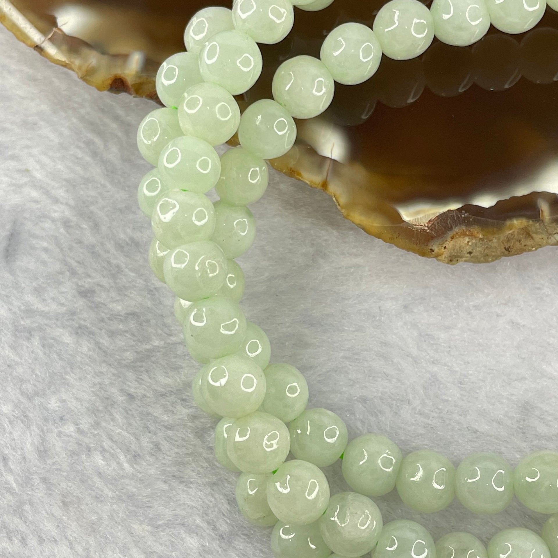 Type A Light Green Jadeite 107 beads necklace 6.6mm 49.61g - Huangs Jadeite and Jewelry Pte Ltd